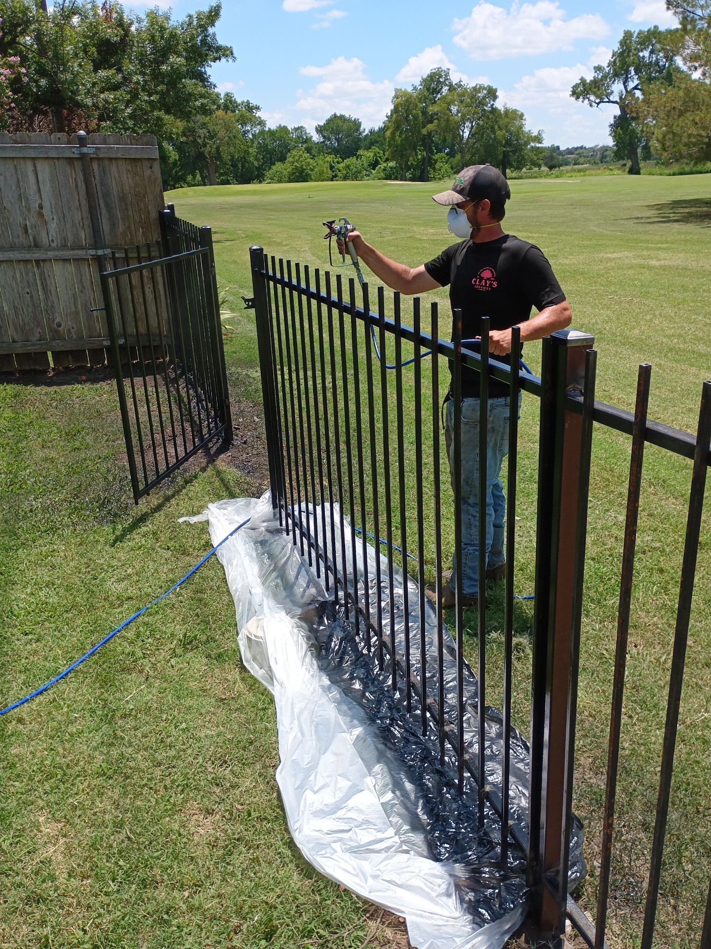 Custom Metal Fence Build by Clays Services Inc