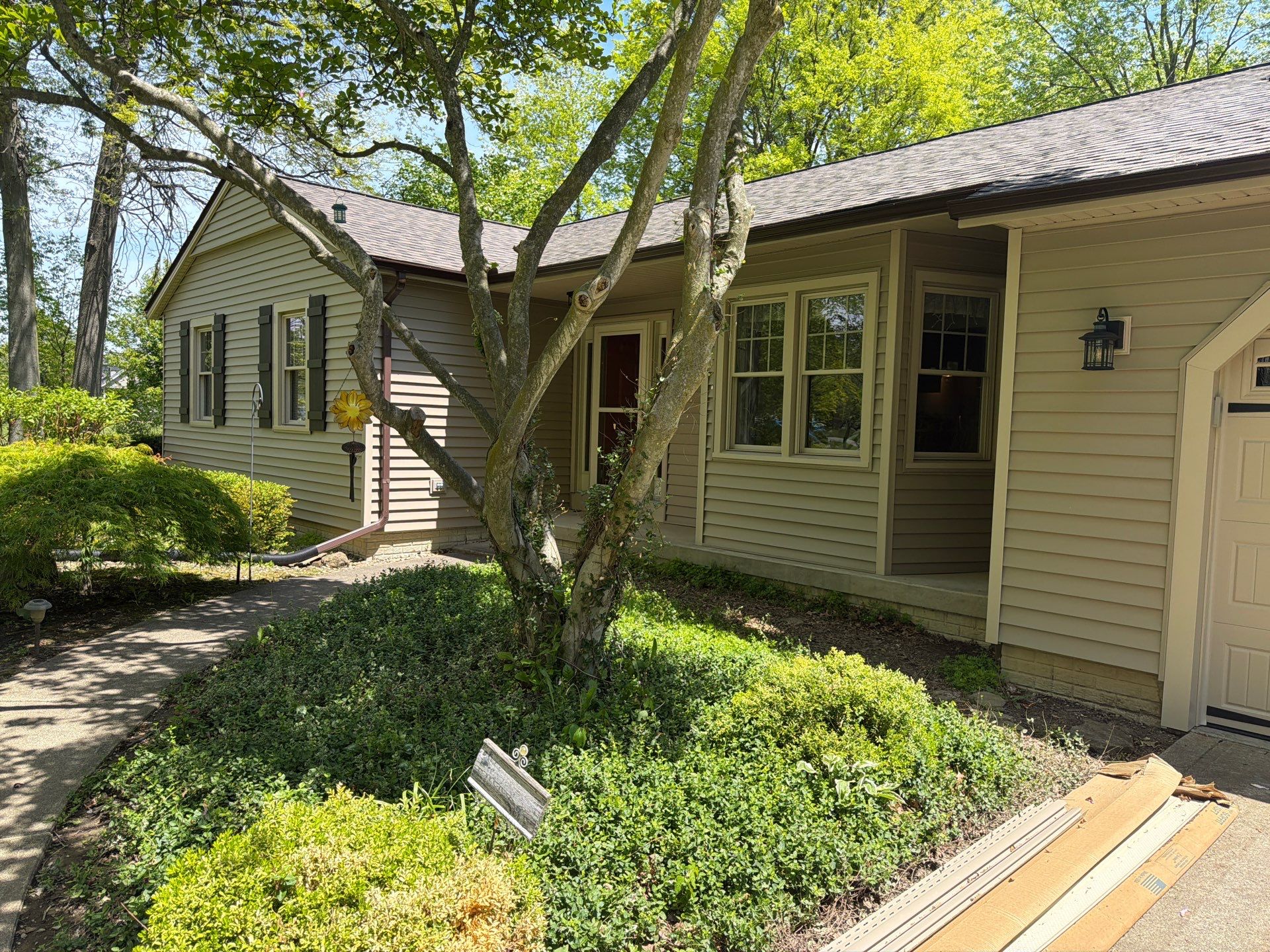 Siding and Garage Door Renovation by Homestyle in Columbia Station by Homestyle Home Improvements (HHI)