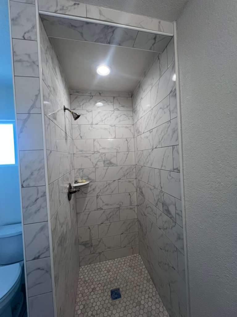 Bathroom shower remodel by Castro Brothers Solutions