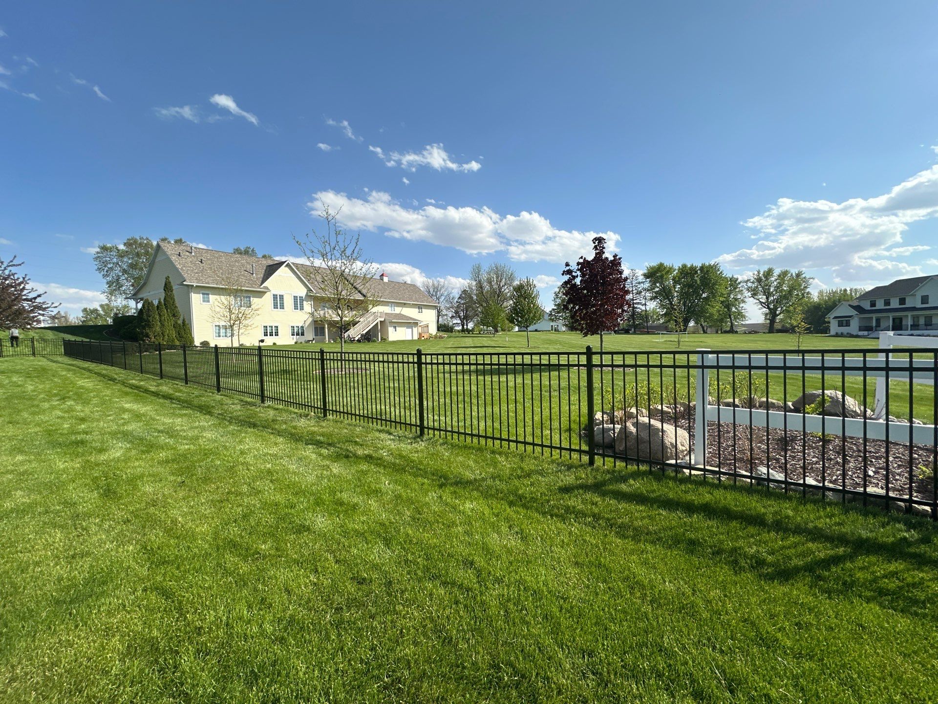 Black Ornamental Metal Picket Fence Installation in Waterloo by Perfect Picket Fence and Stain