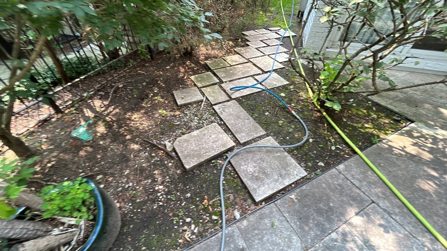 marble patio cleaning and sanding using Polysweep polymeric sand by Northern Power Washing LLC.
