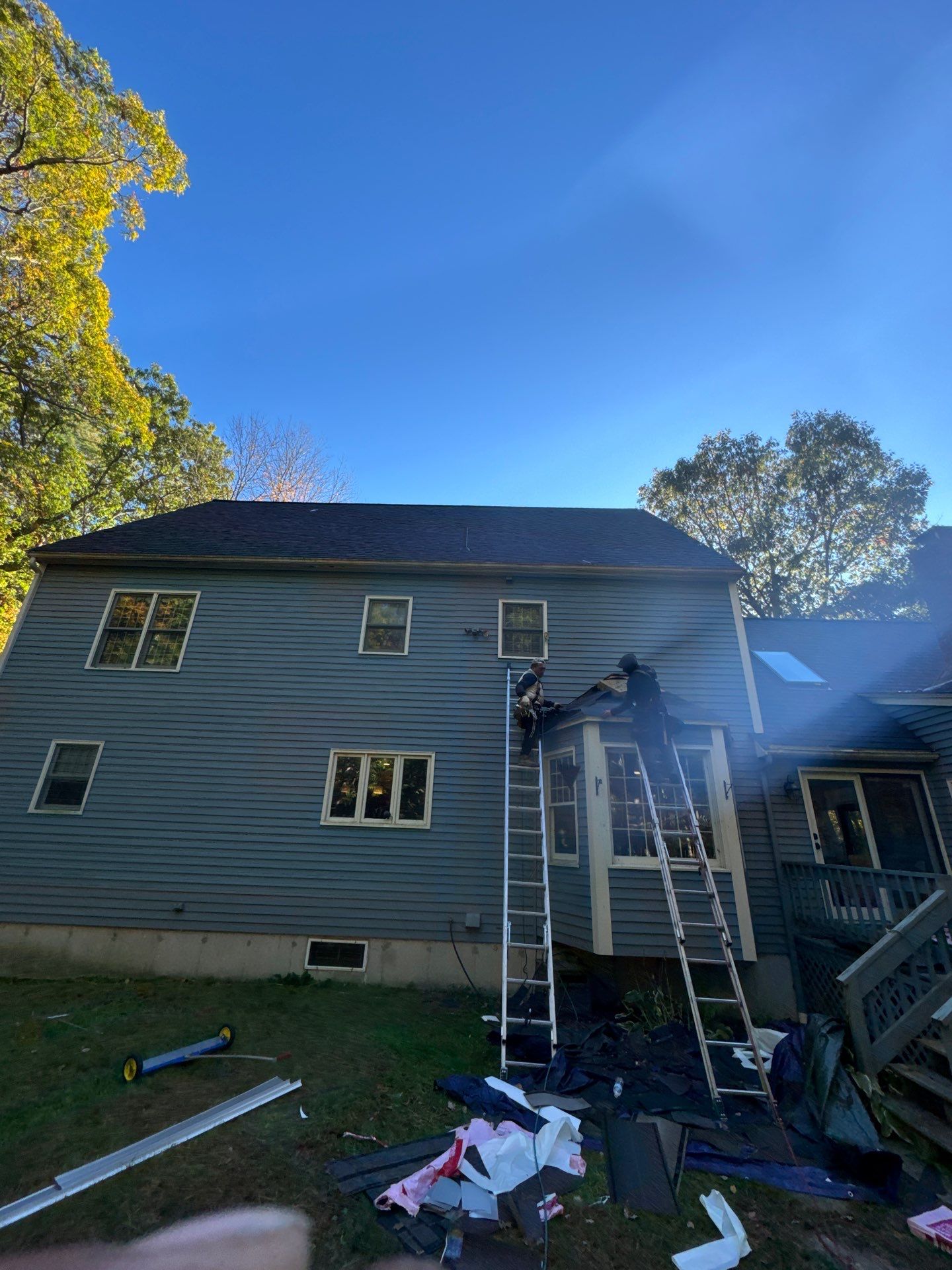 Milford Complete Roof Replacement with Velux Skylight Upgrade by Mighty Dog Roofing of Greater Middlesex County