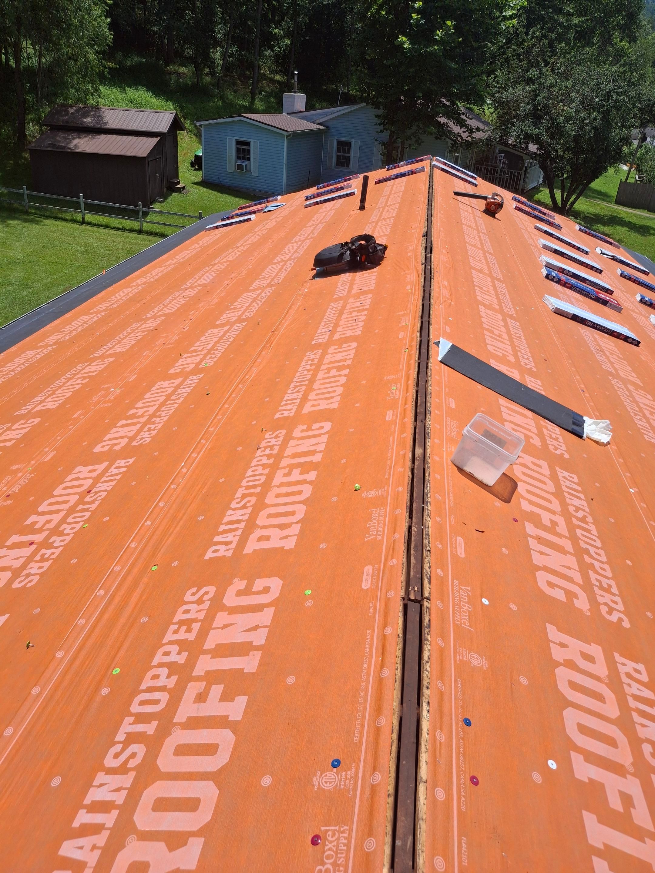 Residential Roofing Installation using GAF Timberline HDZ Charcoal by Rainstoppers Roofing