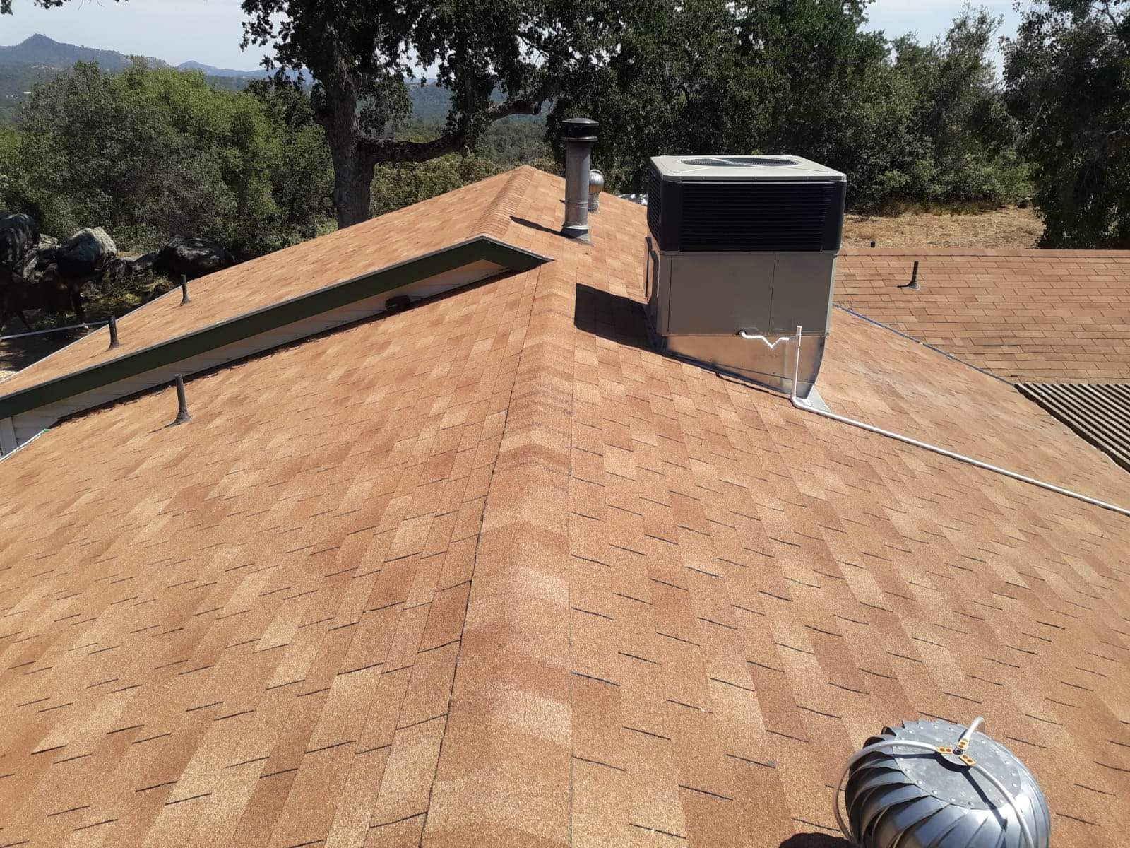 Metal roofing installation using Standing seam metal roofing system by Straight Edge Roofing Inc