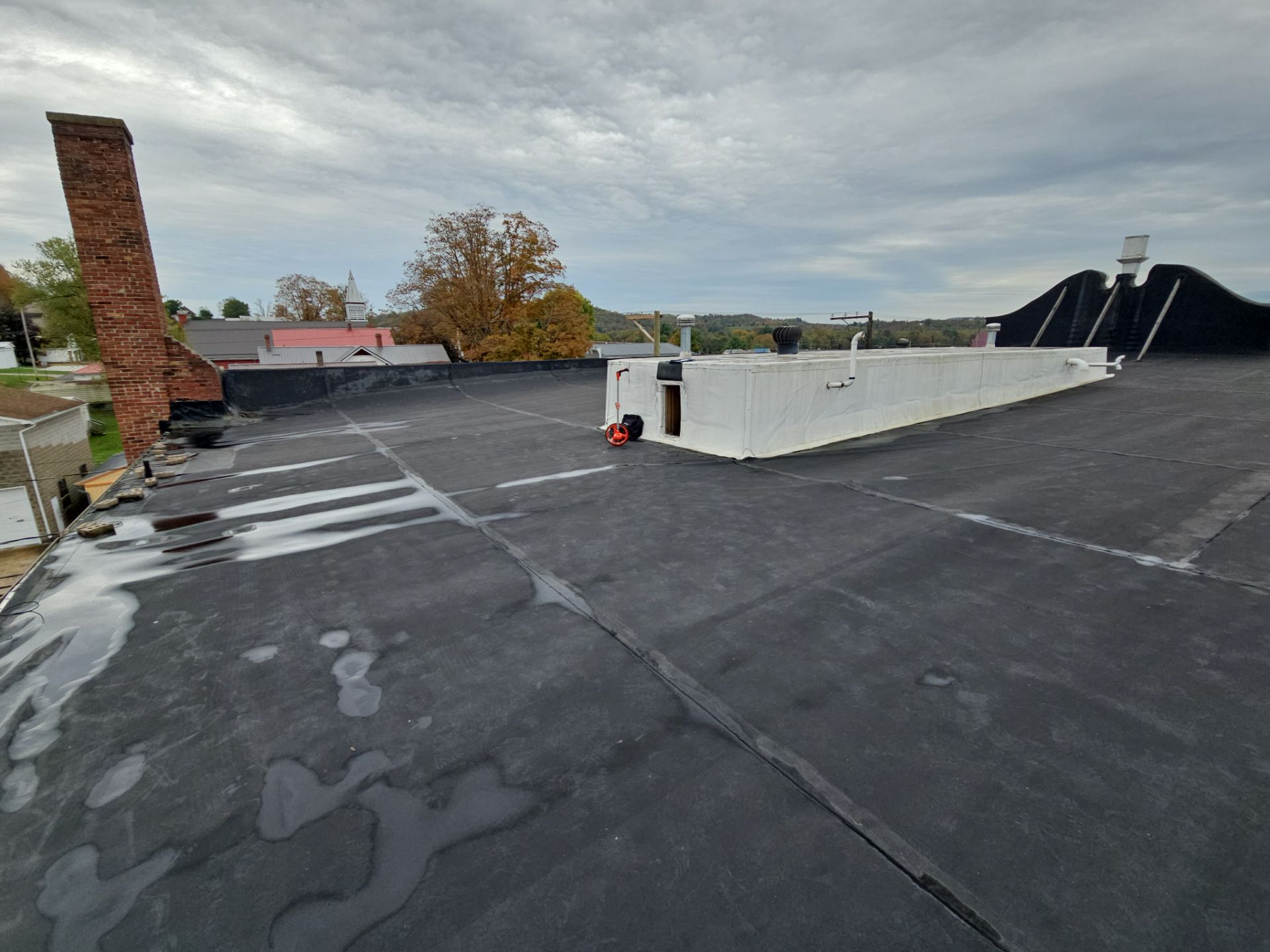 Western Auto  by 768 ROOF, LLC.