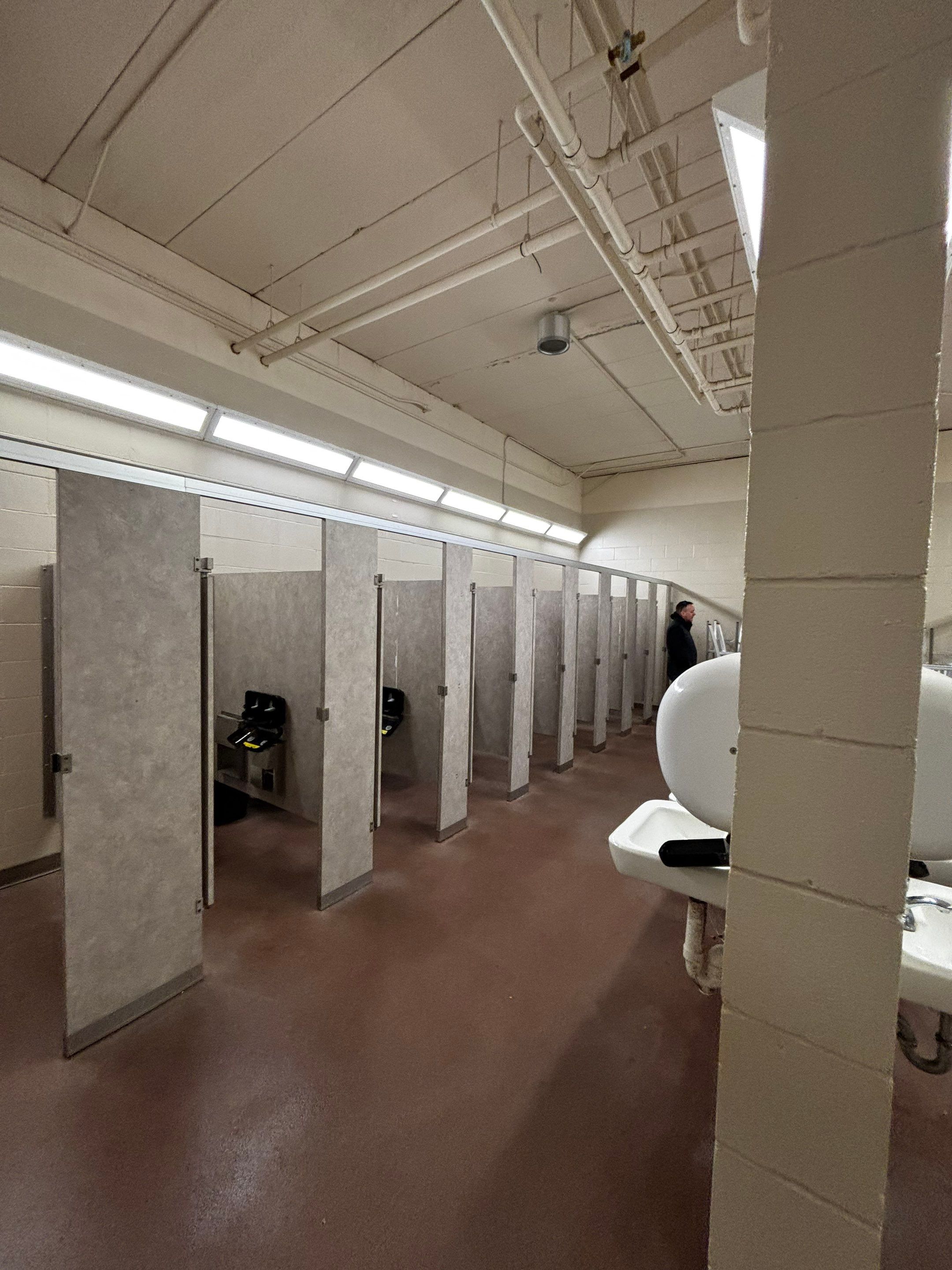 Commercial Restroom Interior Painting and Facility Updates in Sioux Falls by Select Painting, Coatings & Garage Cabinets
