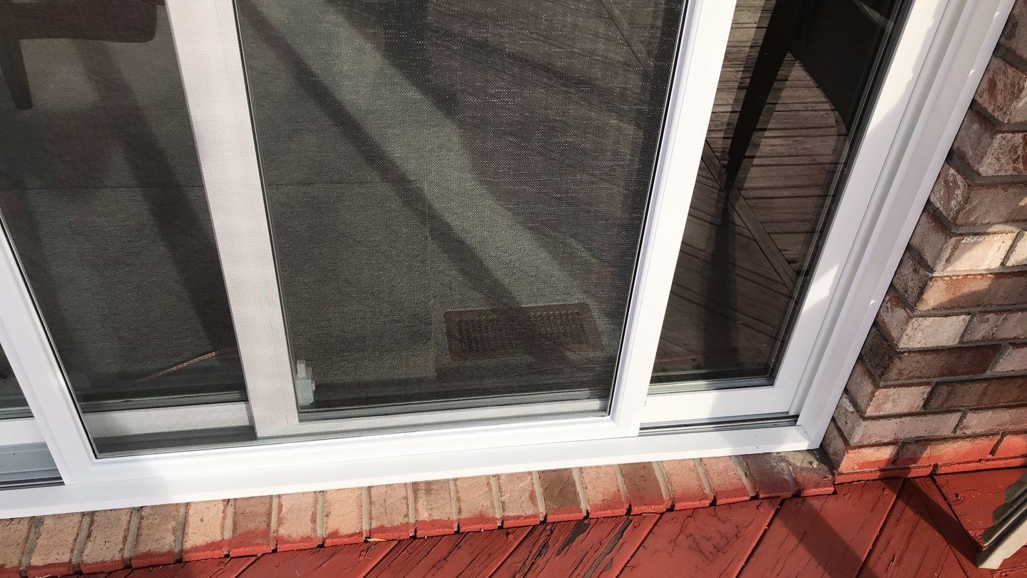Deck Refurbush and Door Replacement using Trex Decking and Railing. Polaris Patio Doors by Secure Construction Company Inc