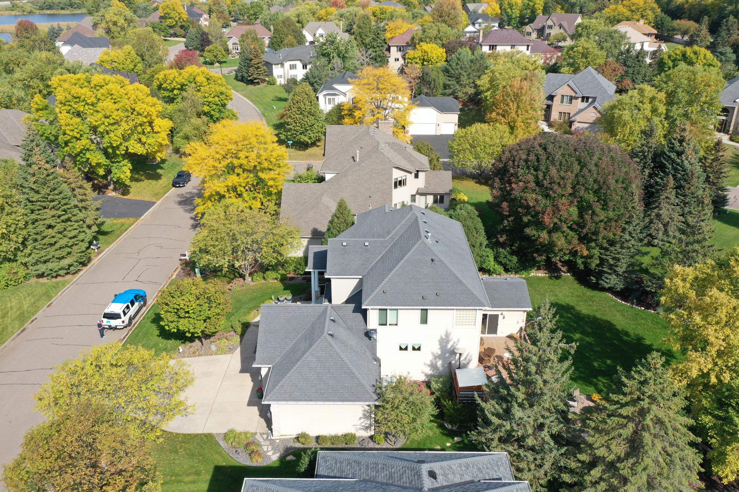 Residential Roofing Installation using Certainteed Landmark Moire Black by MODERN EXTERIOR SYSTEMS