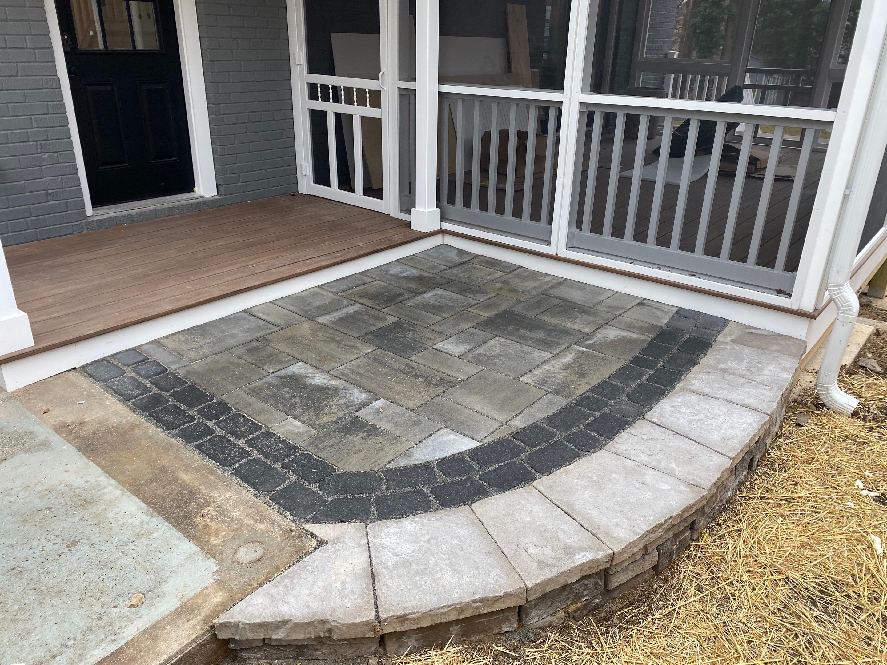 Retaining wall, walkway, small patio and landscape install by The Smet Companies, LLC