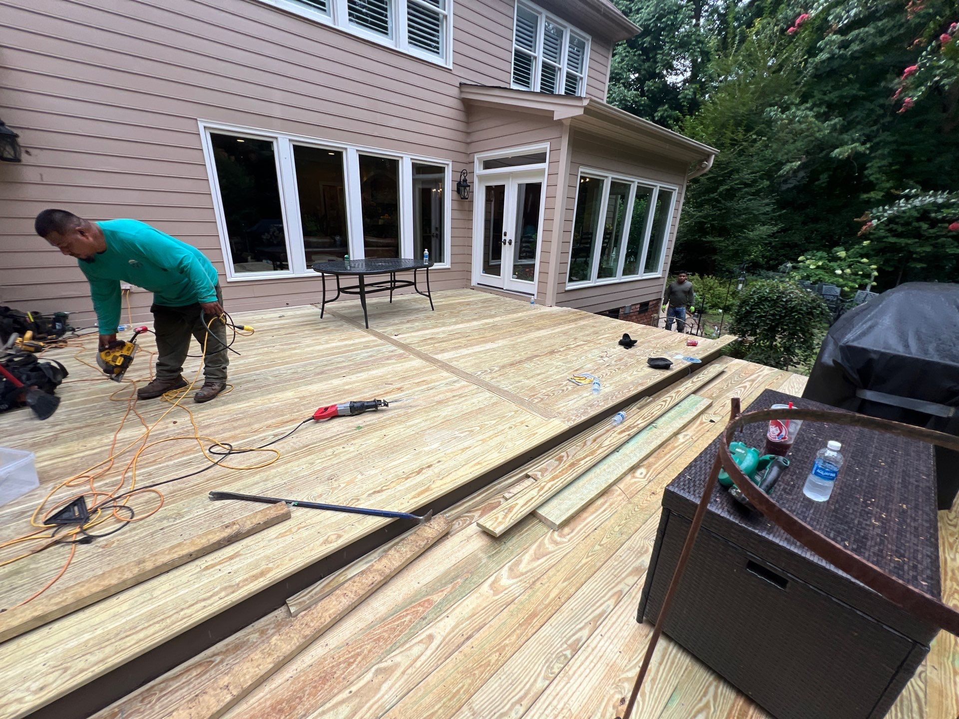 Pressure-Treated Deck Resurface with Black Aluminum Balusters in Broadway by The Remodeling Company