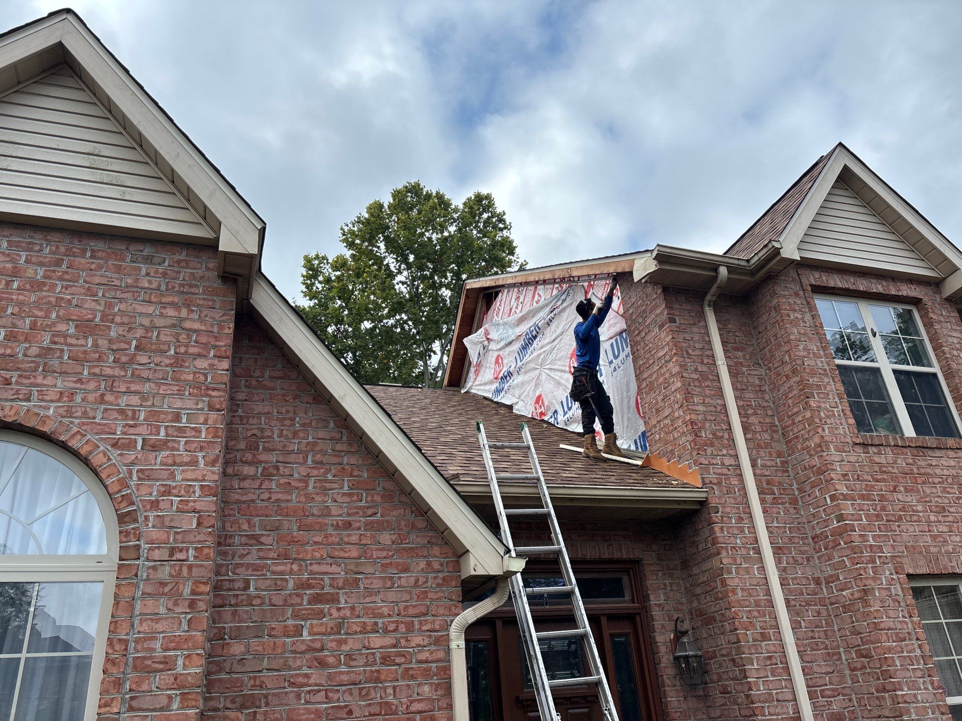 Siding and Certainteed Land Mark Pro Shingles  by Fahey Roofing + Contracting