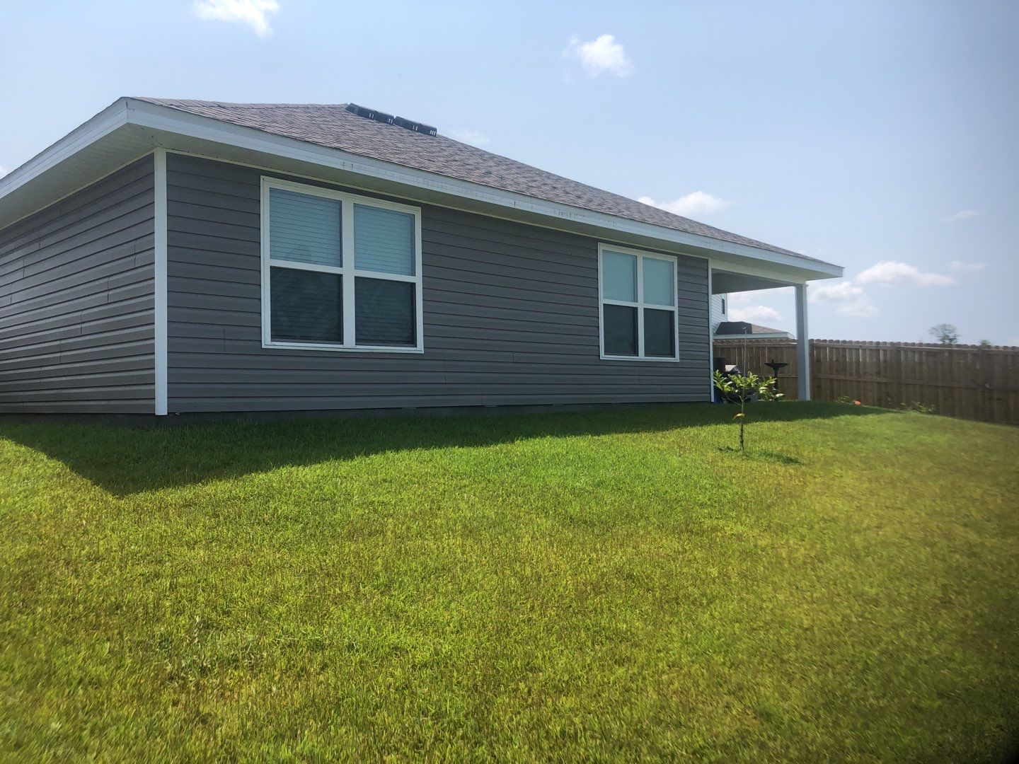 Gutter Installation using K-Style Seamless Gutters and Soffit and Fascia Replacement by Gutter Professors