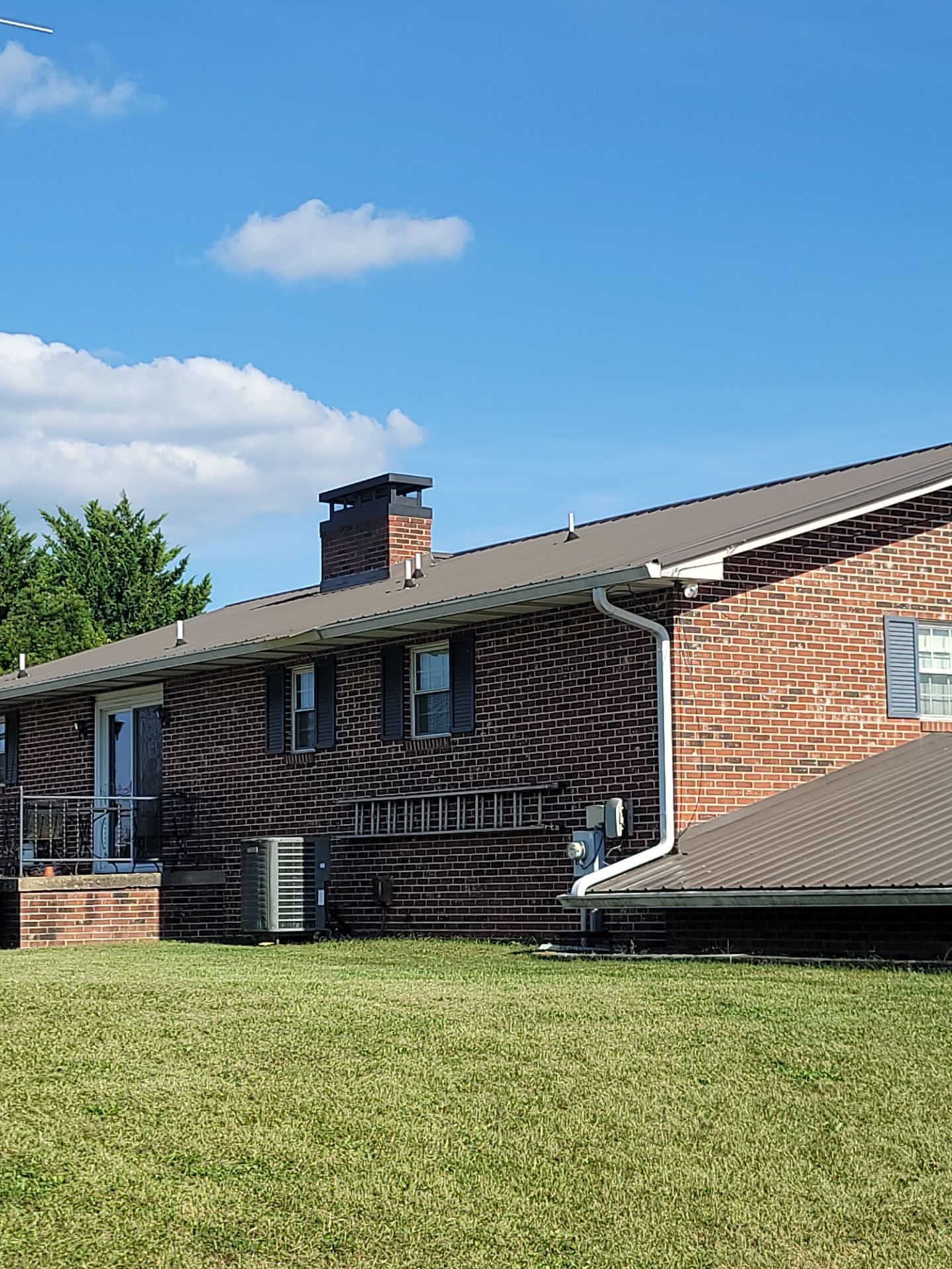 Swisher Residence  by Omnia Roofing