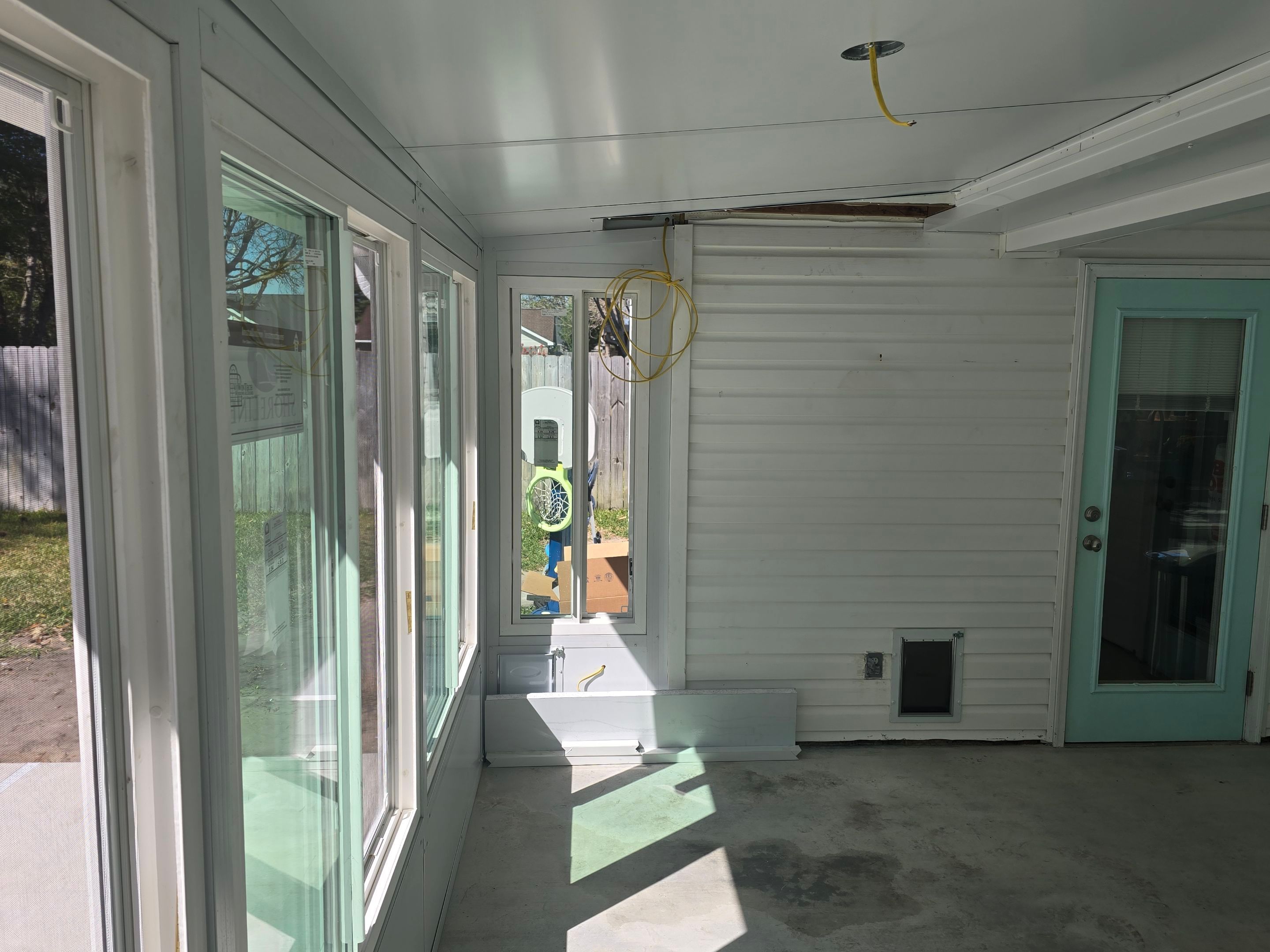 Poolside Glass Room in Gulf Breeze by Titan Sunrooms