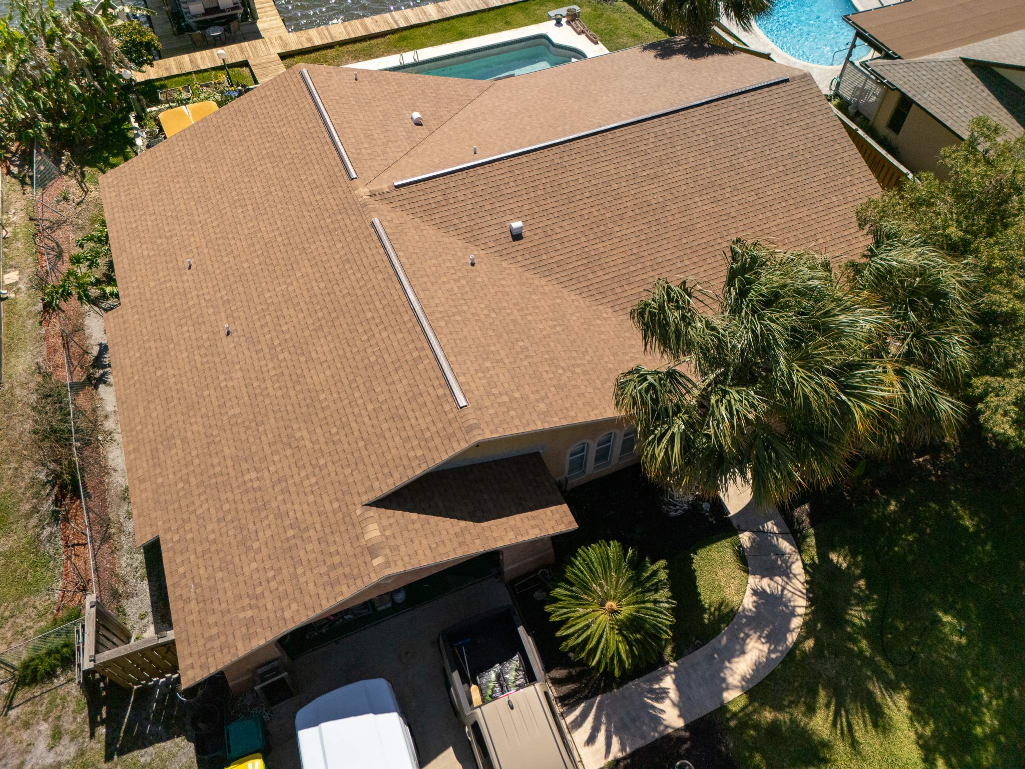 Merritt Island Architectural Asphalt Shingle Roof Replacement and Deck Repair by Wiedmann Construction & Roofing