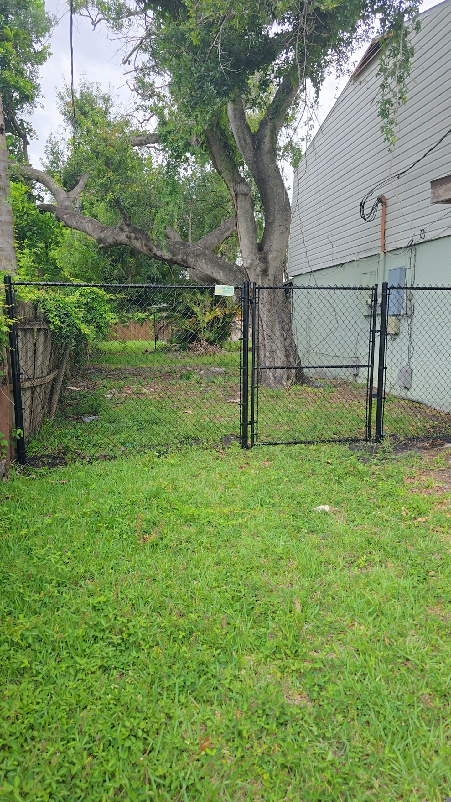 Black Vinyl Chain Link Fence Installation in Bradenton by True Fence LLC