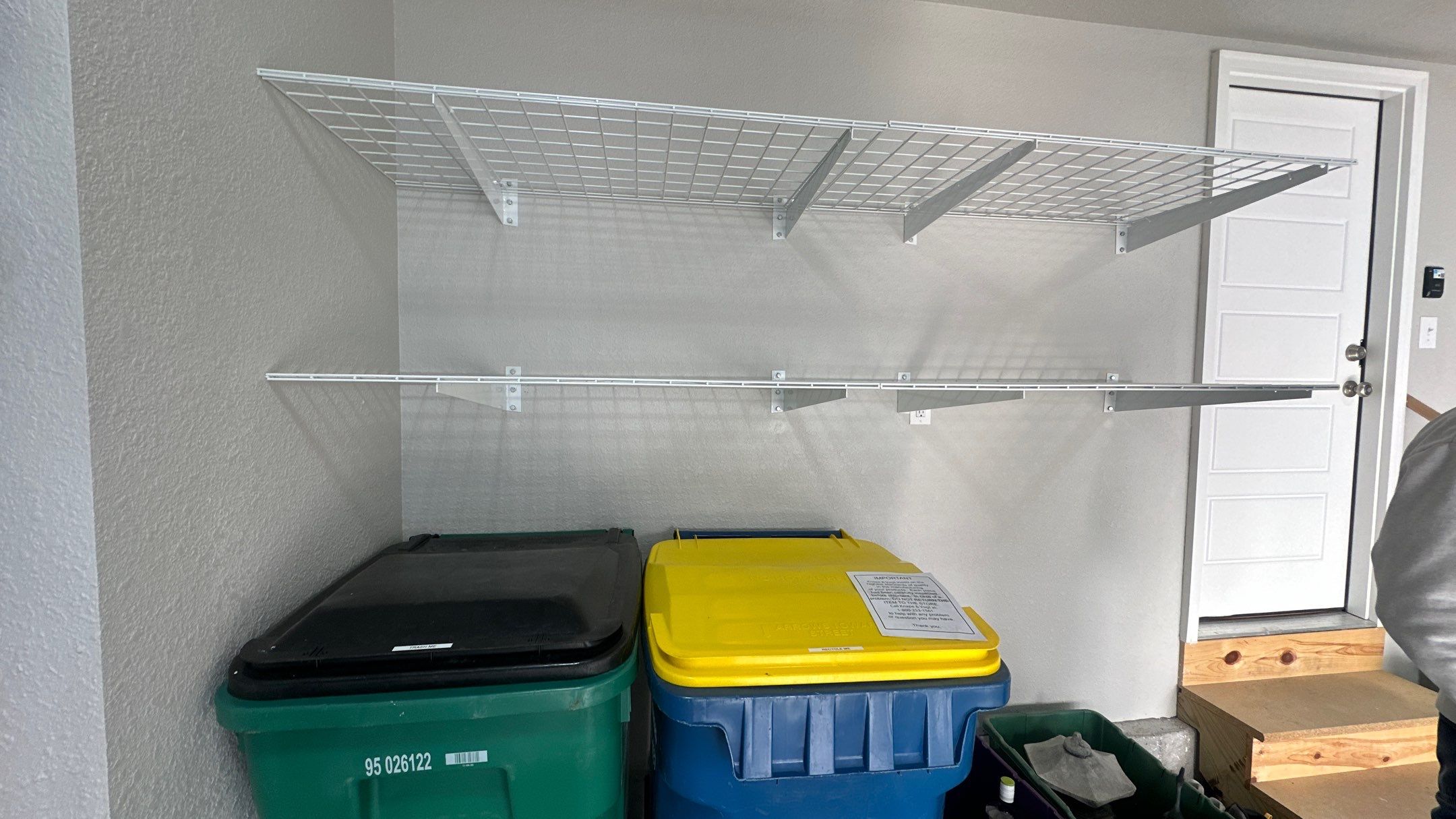 John H. maximized his storage with overhead racks and wall shelves by Banner Garage