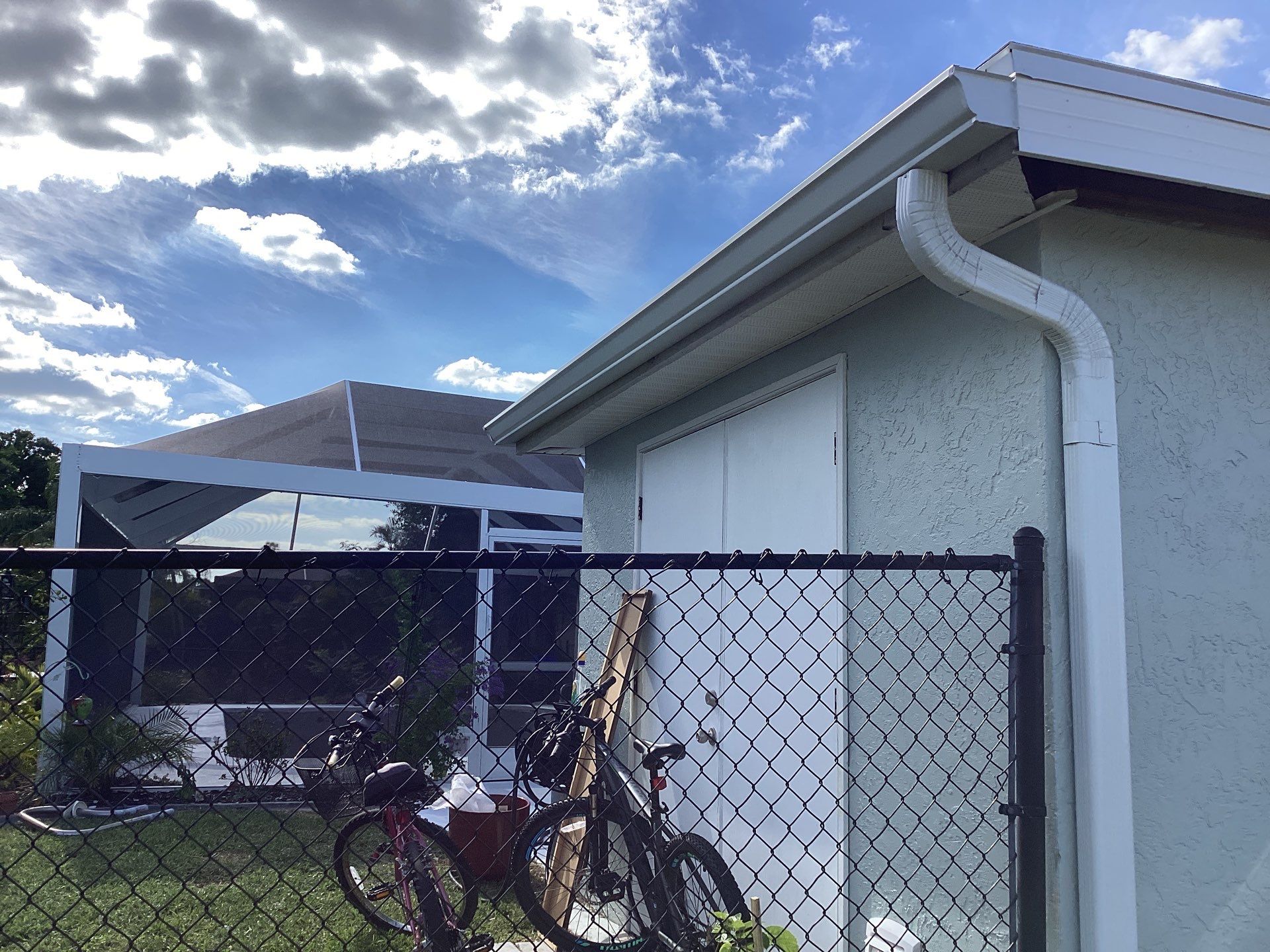 Downspout Installation using 3X4 Elbow Downspout in Cape Coral FL by Gutter Professors