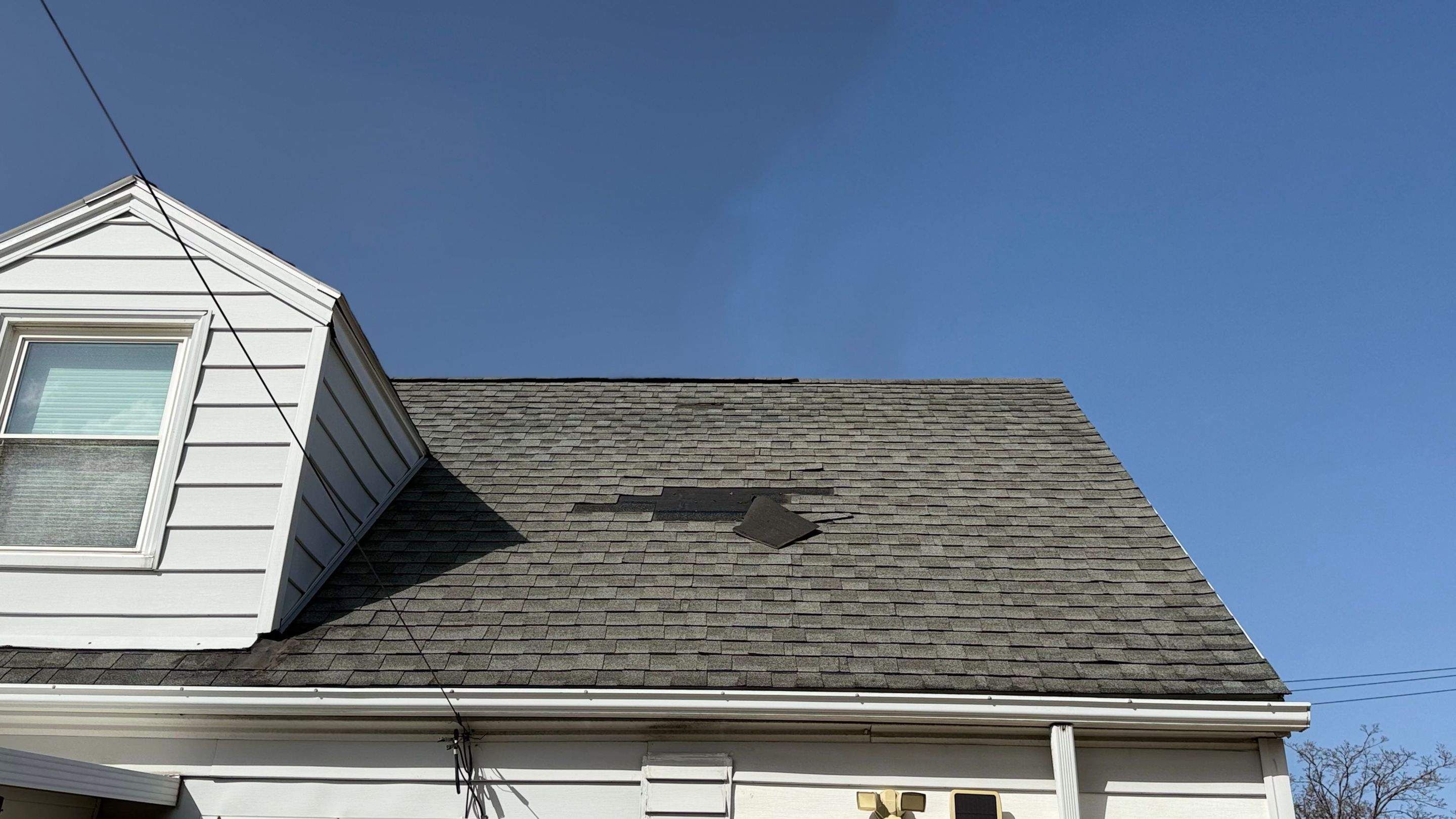 Cleveland Roof replacement - Charcoal shingles by Atlas Roofing & Restoration