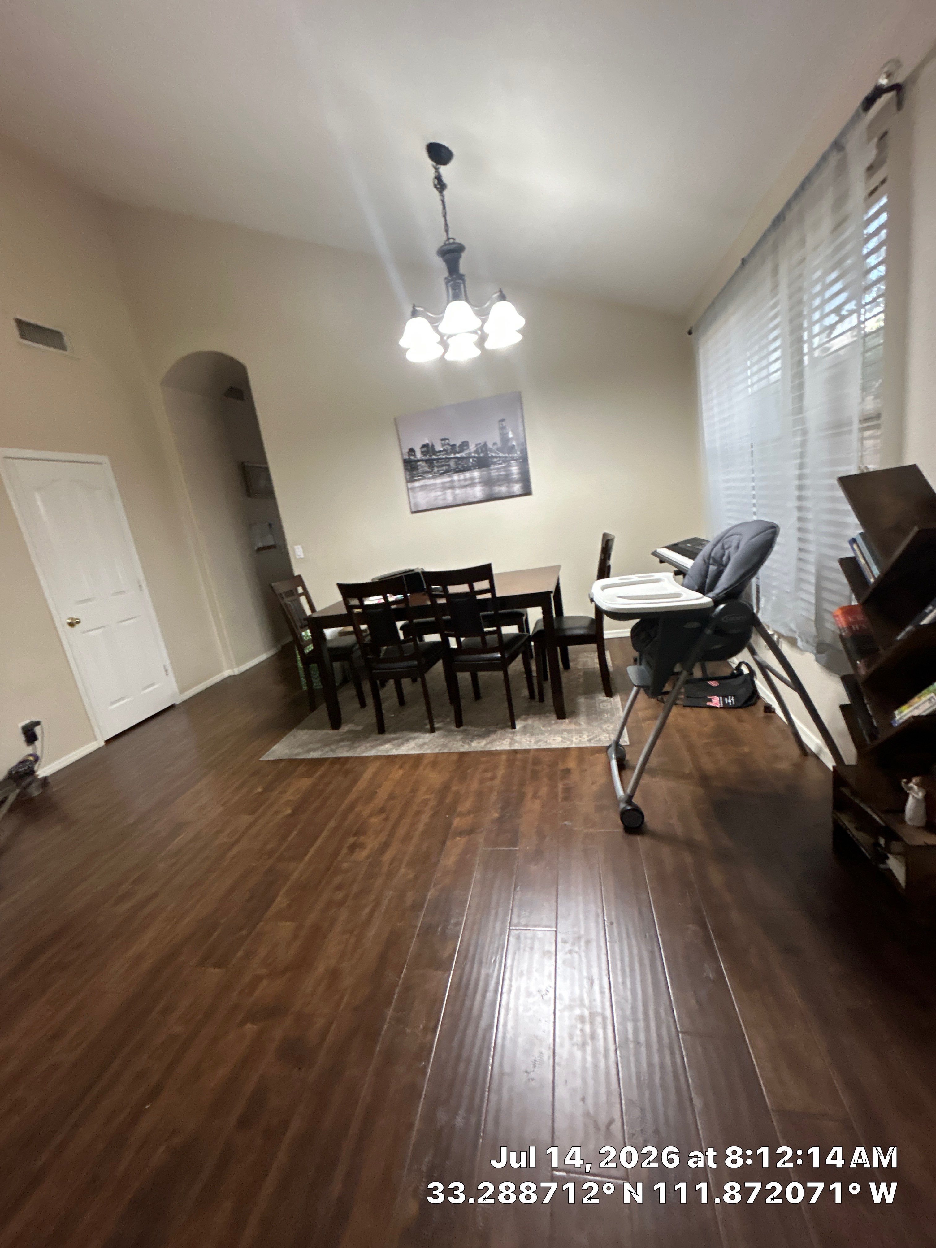 Modern Dining Room Renovation Featuring Wood Look Plank Flooring in Chandler by CompanyCam Sales Demo