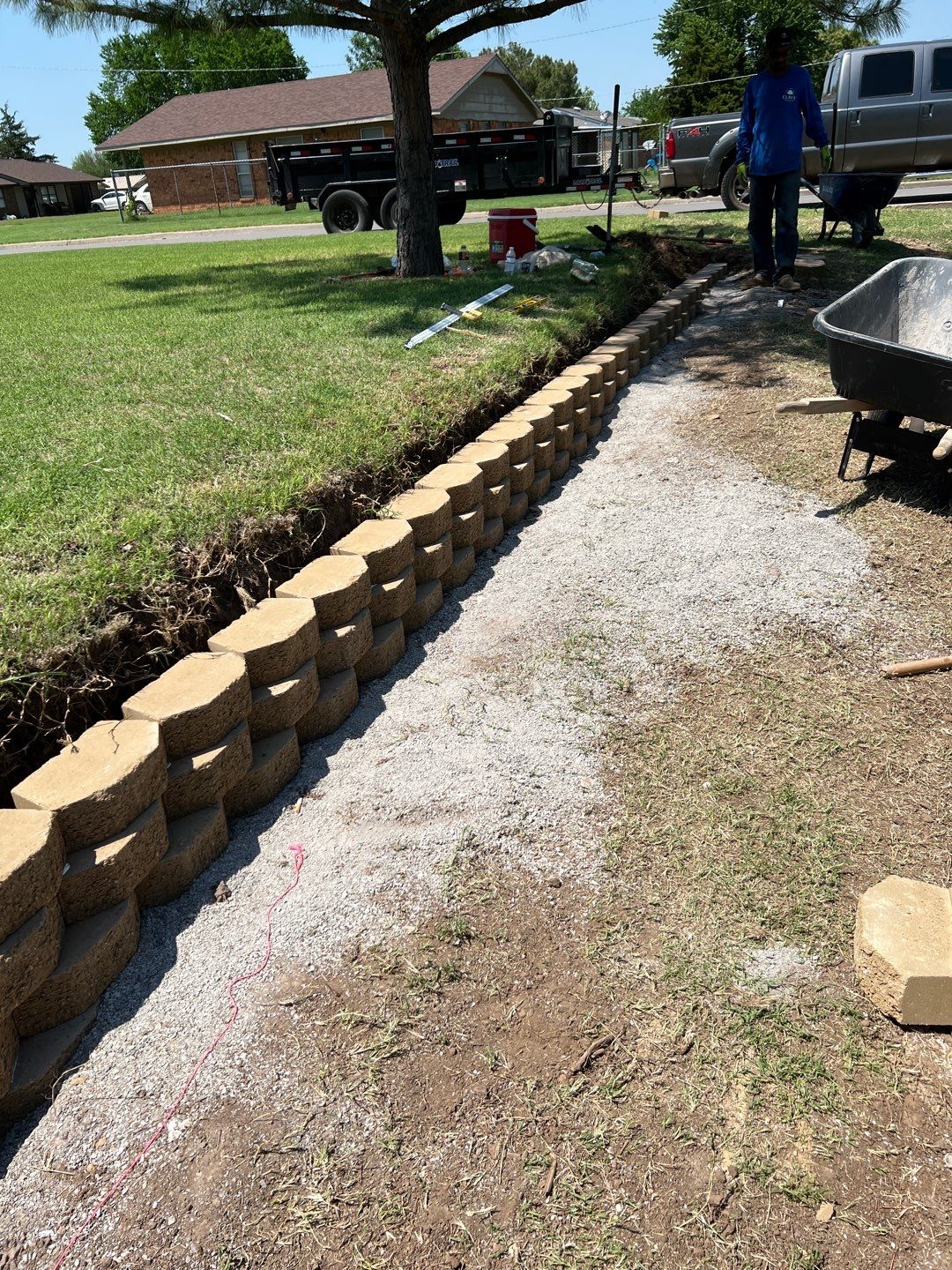 Retaining Wall using Rocks by Clays Services Inc