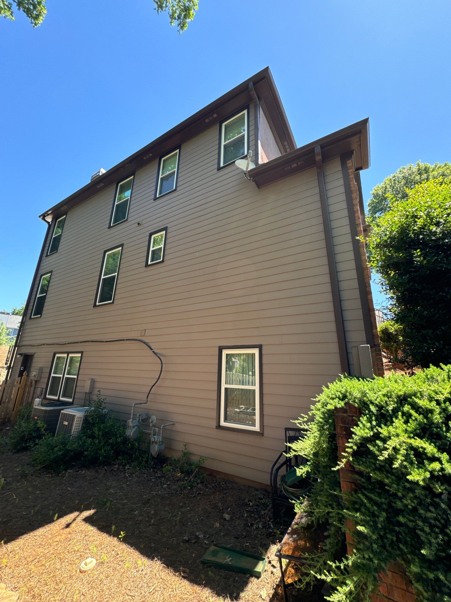 Full Exterior Painting and Gutter Replacement for Powder Springs Home by Swift Home Renovations