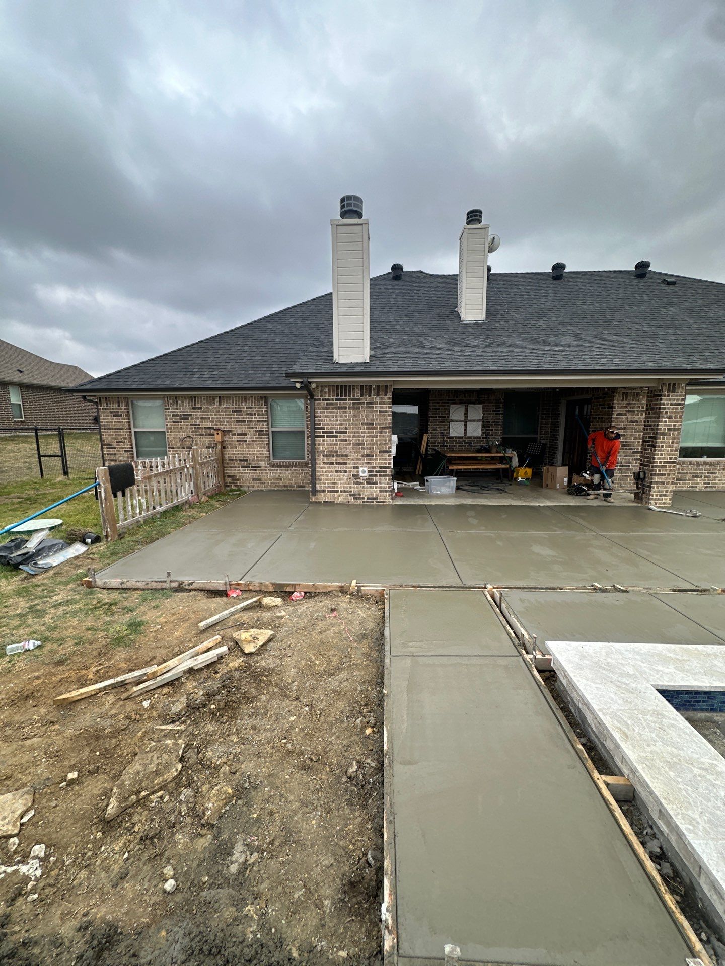 Geometric Pool with Raised Spa and Tanning Ledge by Pinnacle Pools and Spas - DFW