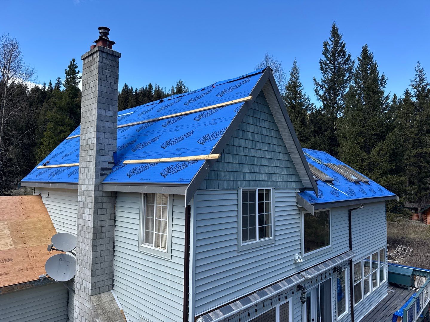 Shingle to Metal Roof Conversion by Top Notch Roofing Inc