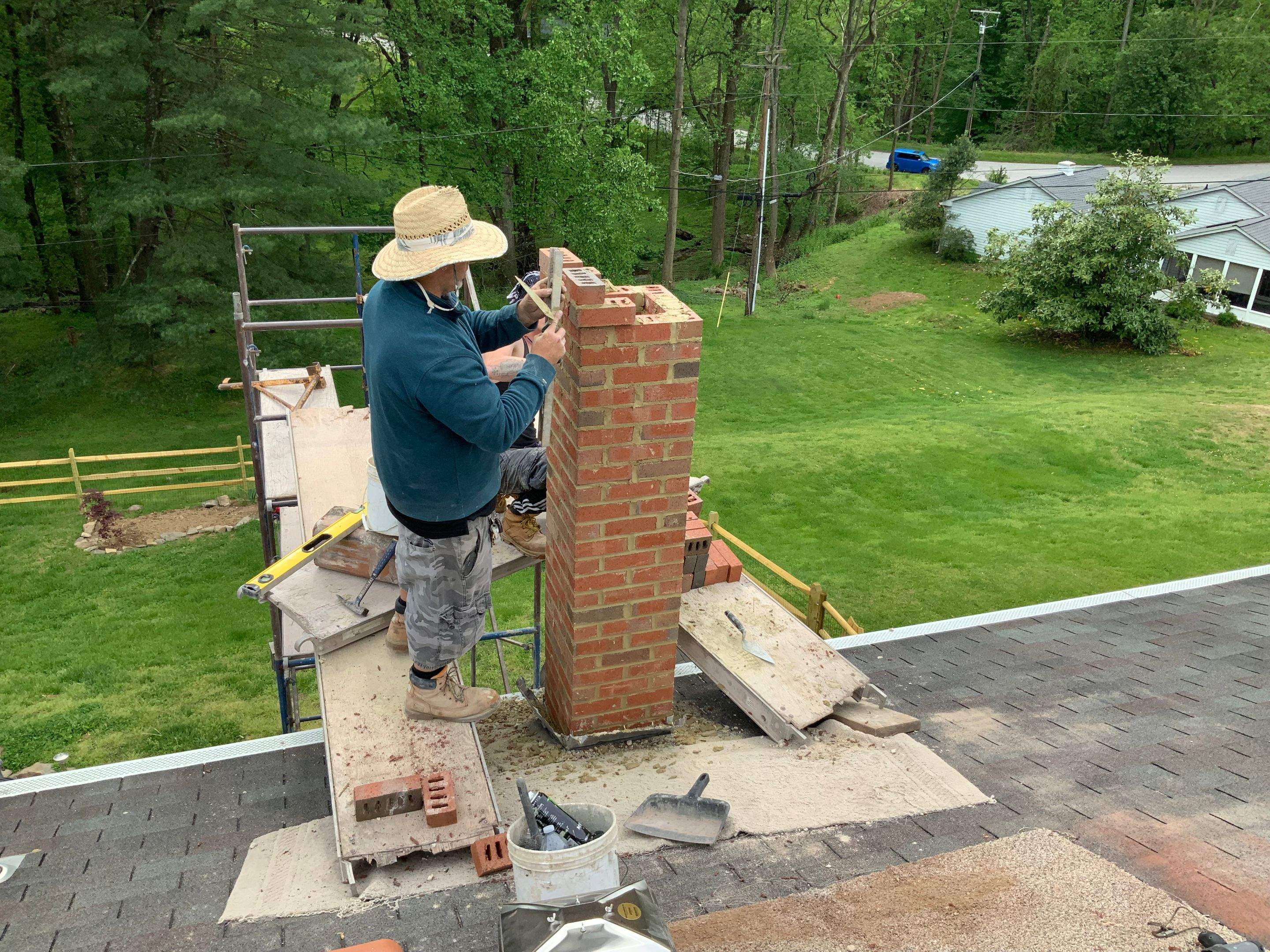 Residential Roofing Installation using Landmark Shingles Color Weatherwood by Alpha Design Services