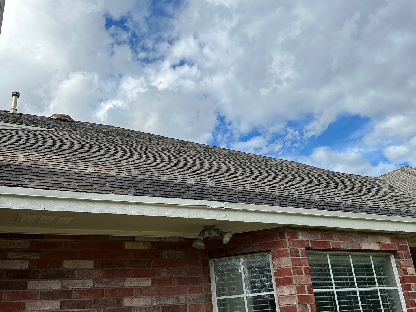 Residential Roofing Installation using Certainteed Landmark Moire Black by Galvan Roofing and Construction