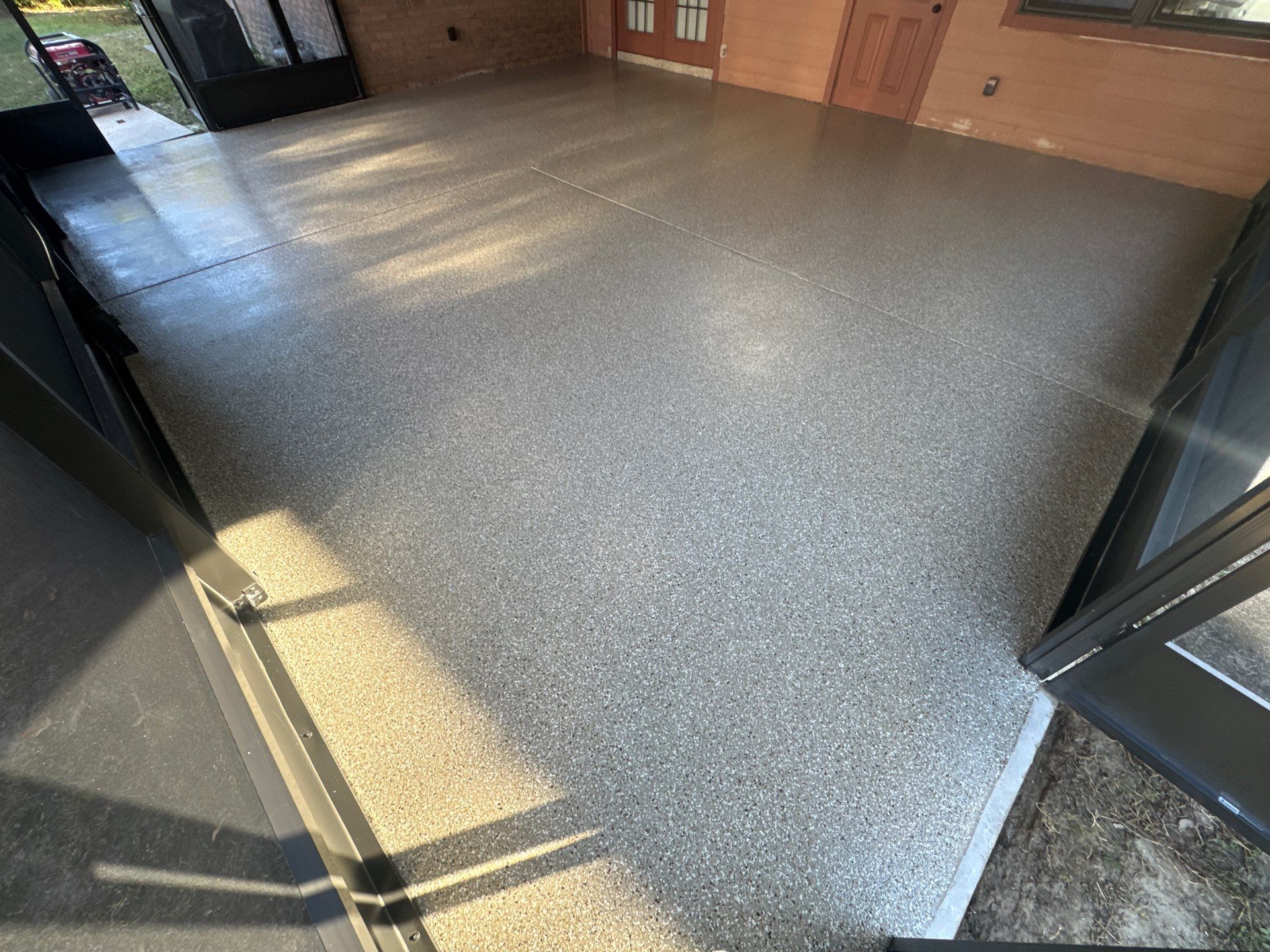 Porch in Lake City, FL in Pebble Beach by Cross Creek Concrete Coatings