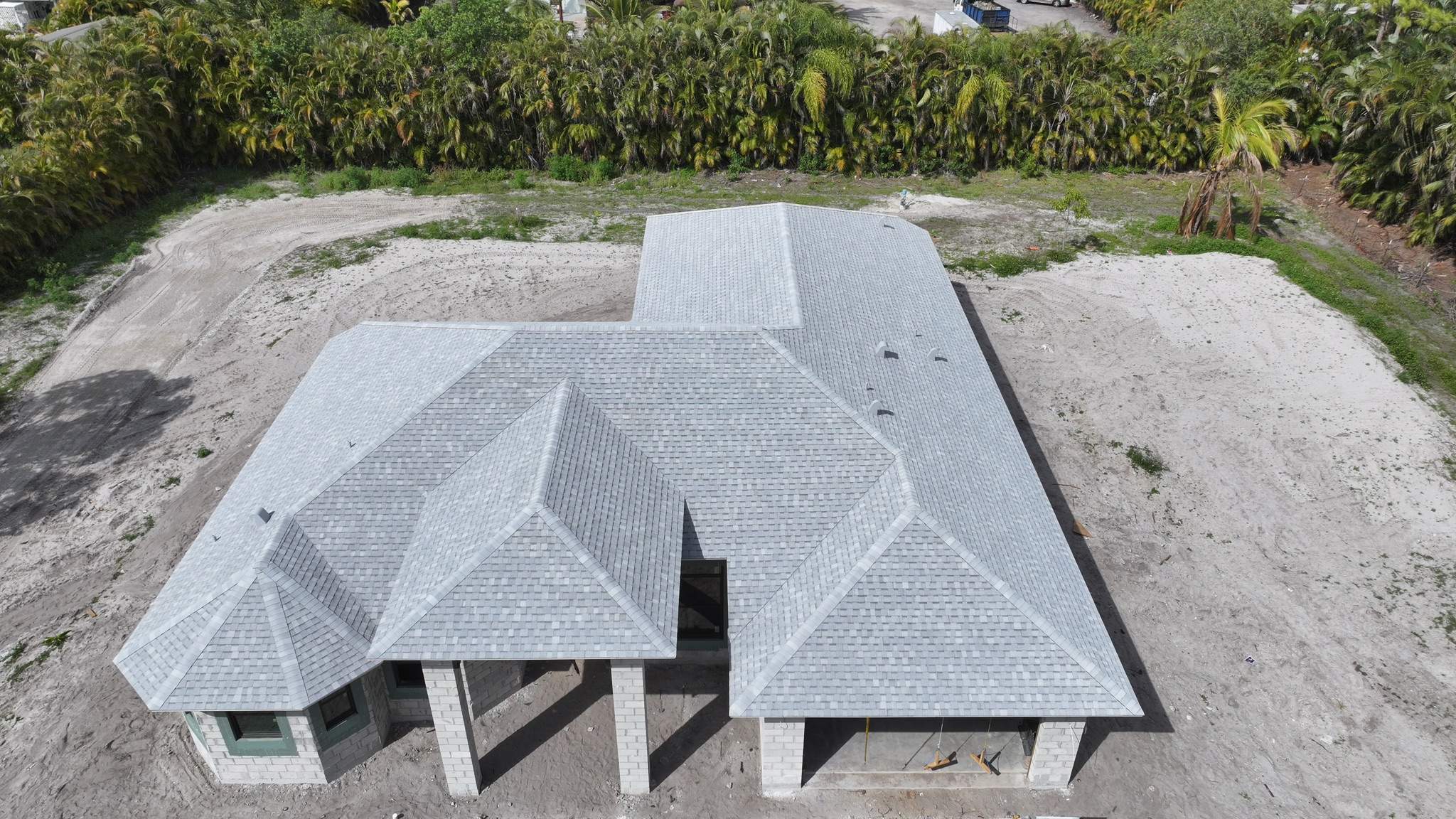 Tamko Heritage Glacier White by Total Roofing System The Metal Roof Experts