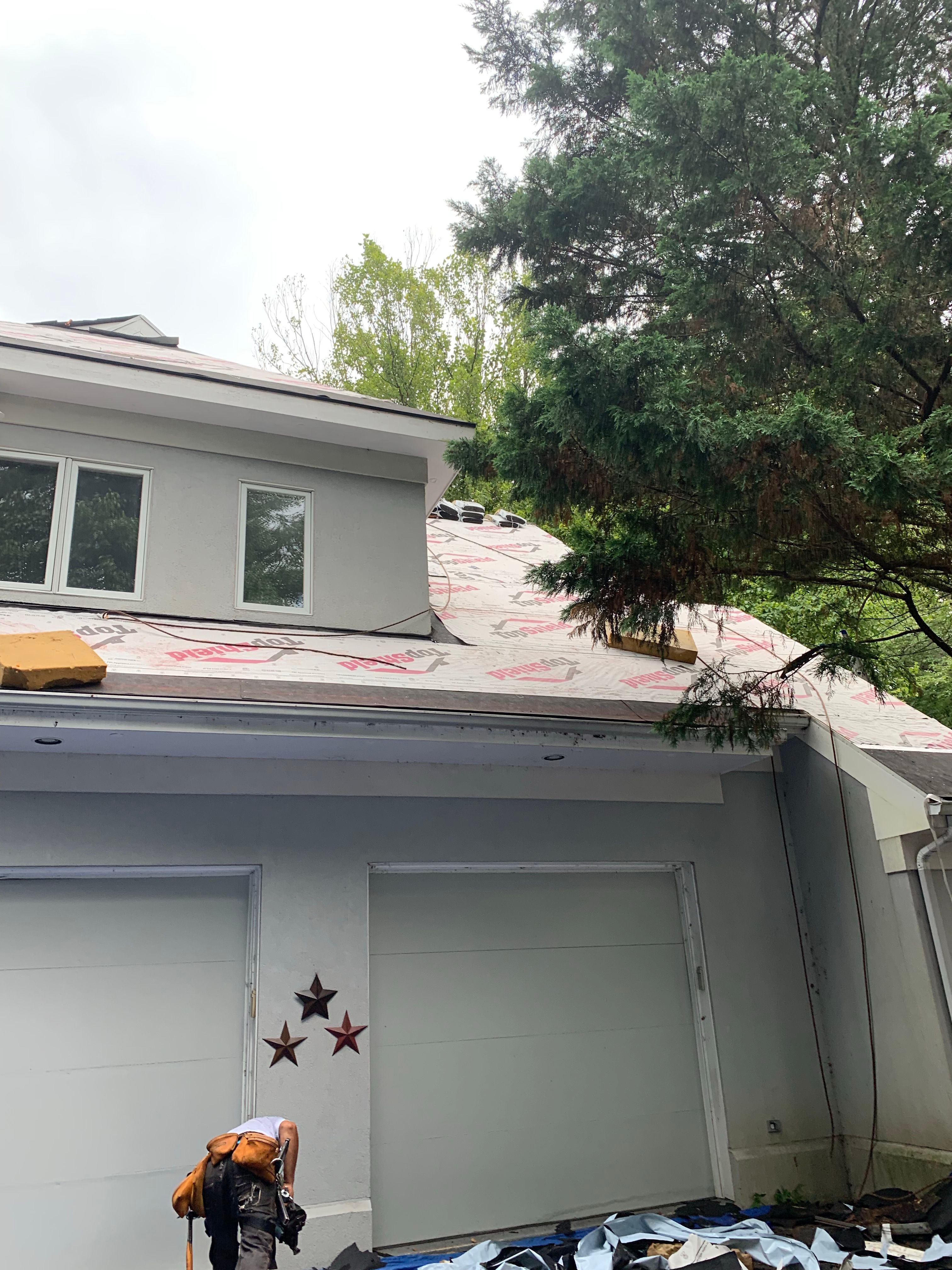 Skylight, Roof, and Gutter Replacement by American Home Contractors