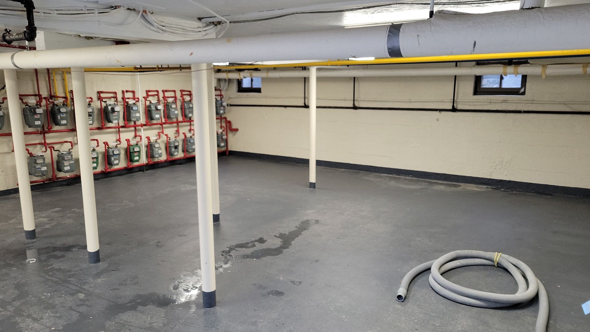 Laundry Room Floor Coating using Penntek- Silver Creek by Spectrum Painting, LLC