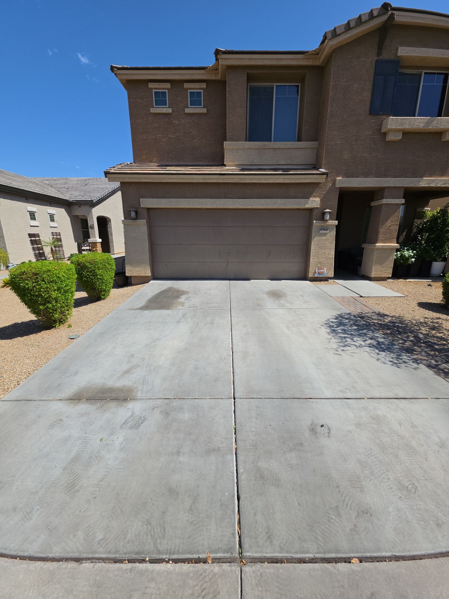 Driveway Oil Stain Removal in Del Rio Ranch, Avondale, AZ 85323 by Patriot Power Washing & Sanitation
