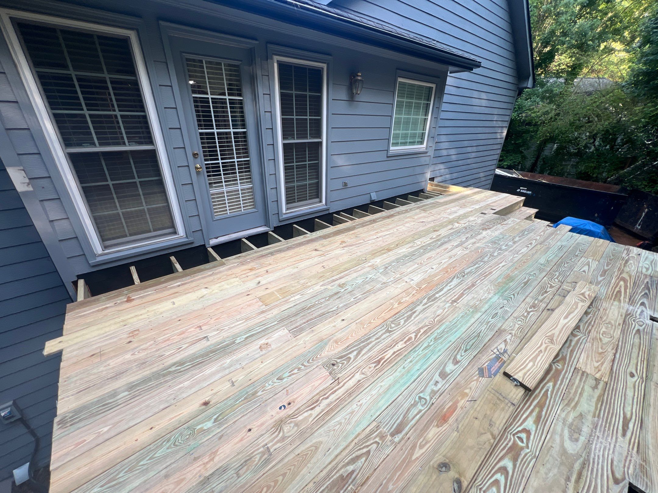 Pressure-Treated Wood Deck Replacement and Staircase Installation in Kennesaw by Swift Home Renovations