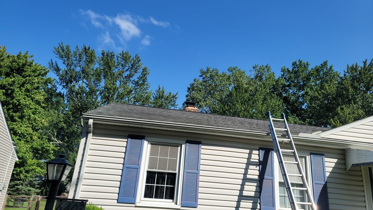 ATLAS PINNACLE COLOR: PRISTINE BLACK SHADOW DRIP EDGE: WHITE by Eagle Eye Roofing