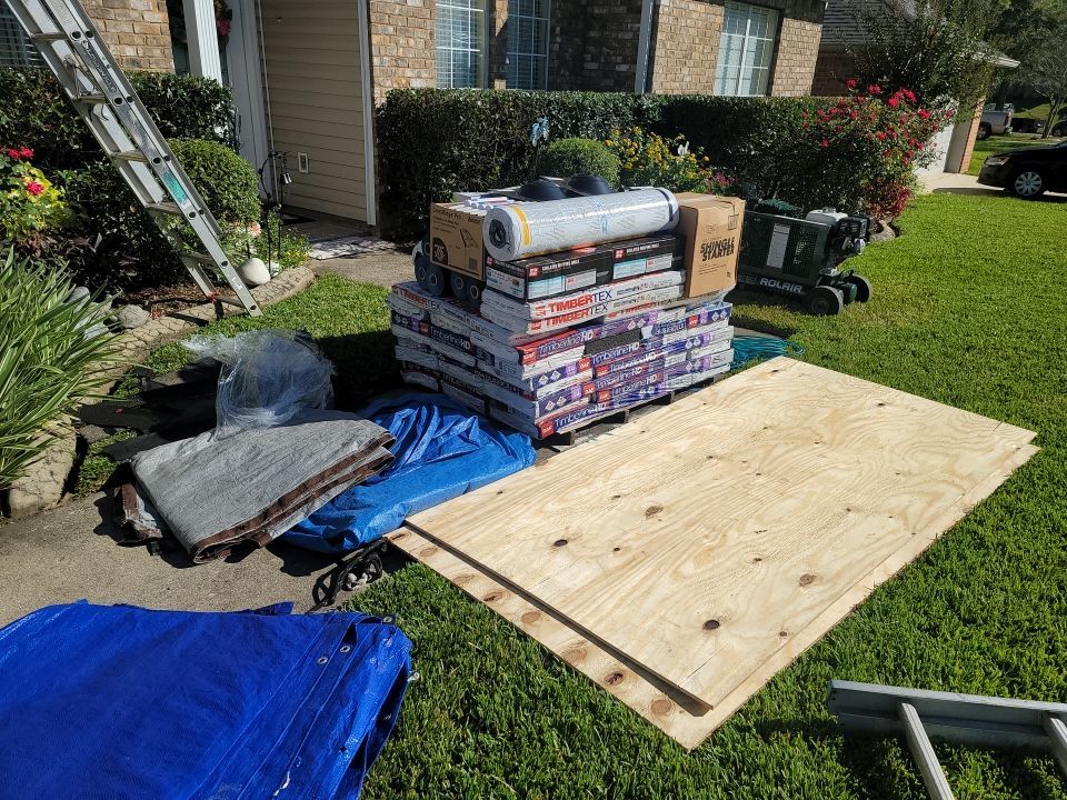Residential Roofing Installation using Roof Replacement by American Roofing & Construction LLC