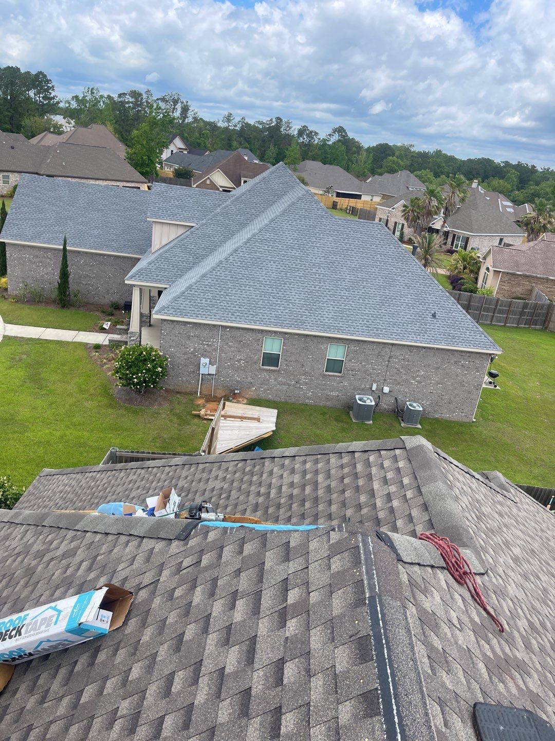 Residential Roofing Installation using Roof Replacement by American Roofing & Construction LLC