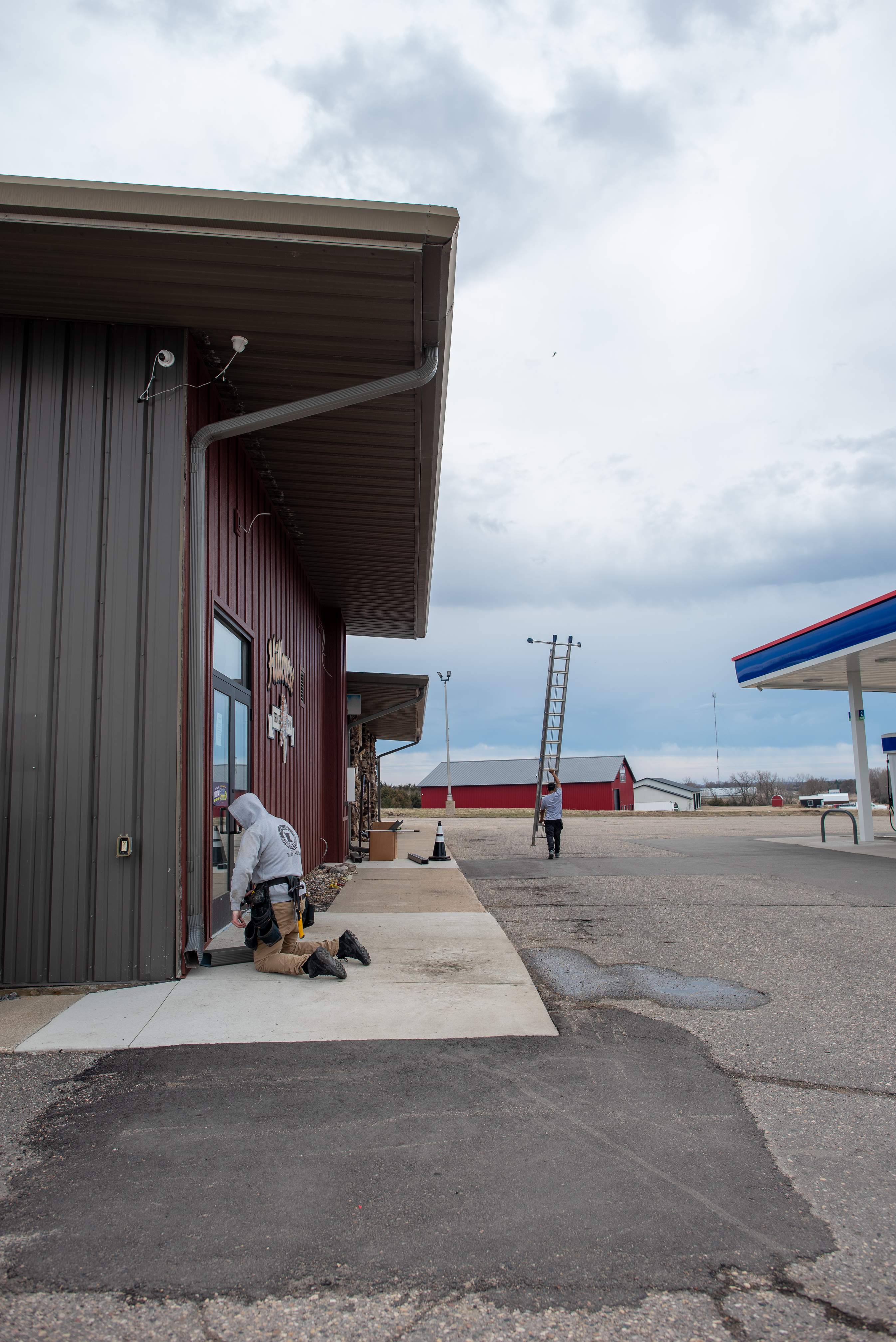 Commercial Gutter Repair in New London MN | Reseaming Gutters & New Downspouts by Next Level Seamless Gutters / Exteriors Inc.