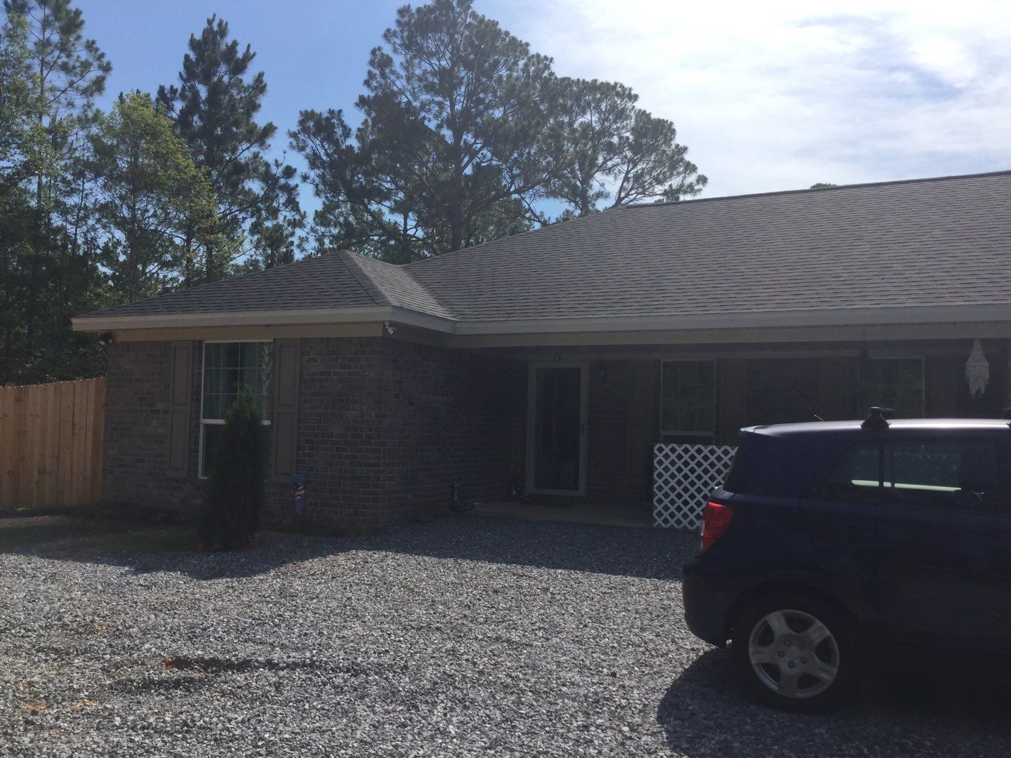 Downspout Installation using White Down Spouts in Milton FL by Gutter Professors