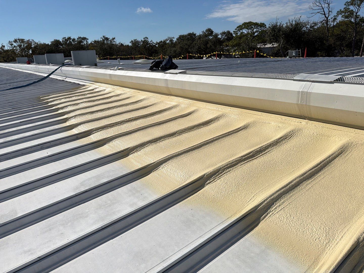 Sarasota Industrial Warehouse Metal Roof Silicone Coating Restoration by CES Roofing