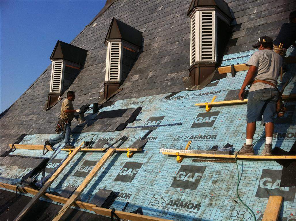 Historic Building ROOF REPLACEMNT with GAF TruSlate  on steep slop and Versico 60mil TPO on flat roof by Gorilla Exteriors Contracting, LLC