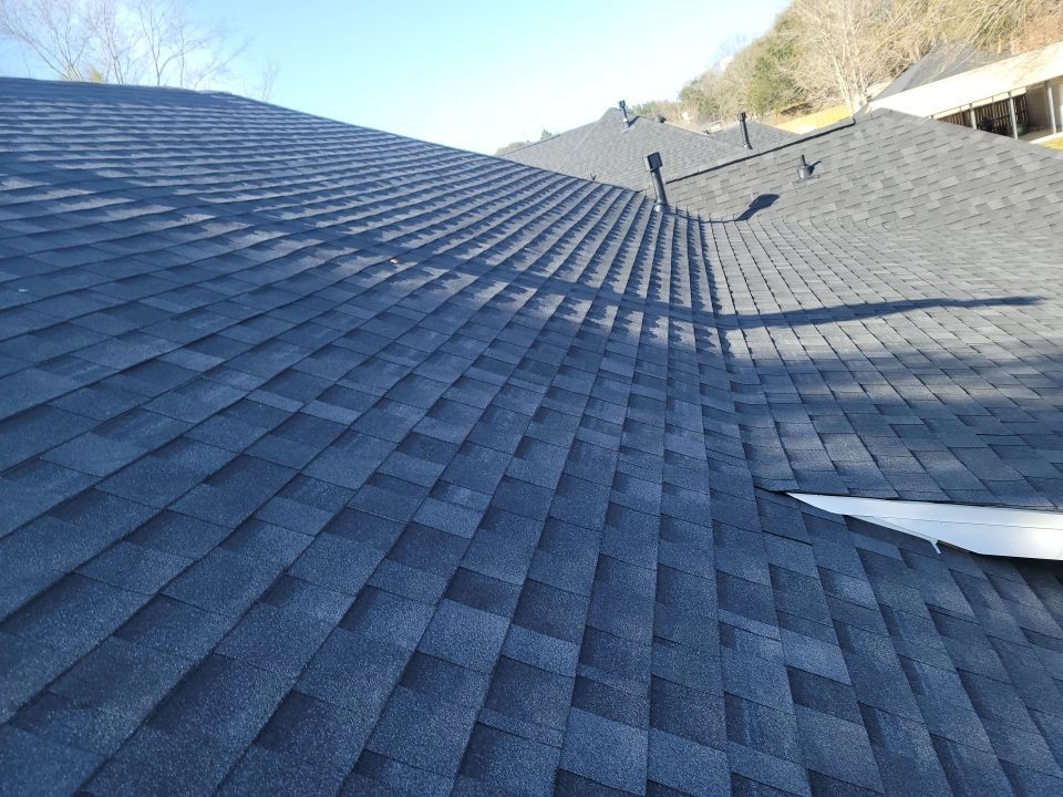Residential Roofing Installation using Roof Replacement by American Roofing & Construction LLC