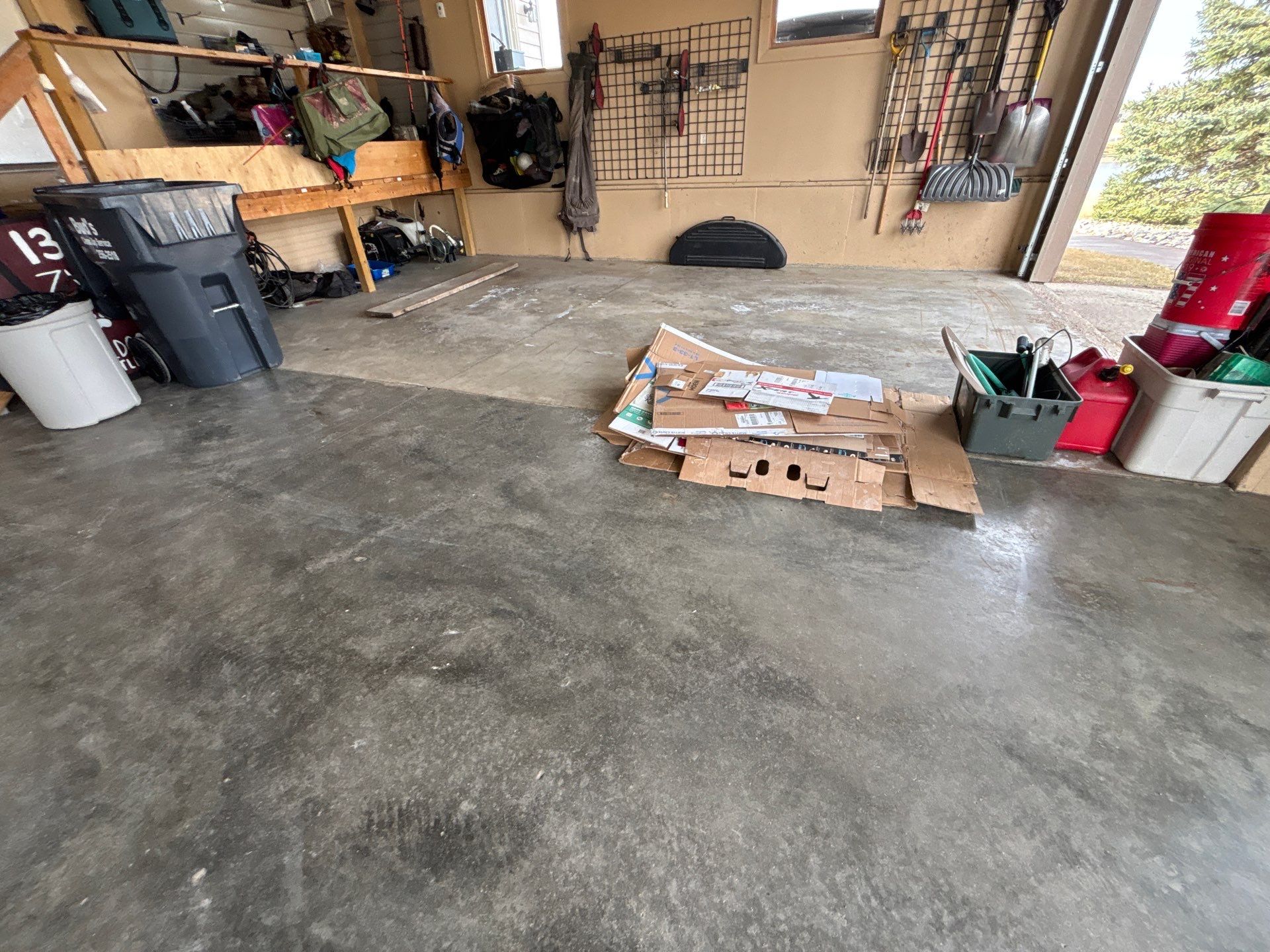 Residential Garage Floor Transformation with Speckled Epoxy Coating by Select Painting, Coatings & Garage Cabinets
