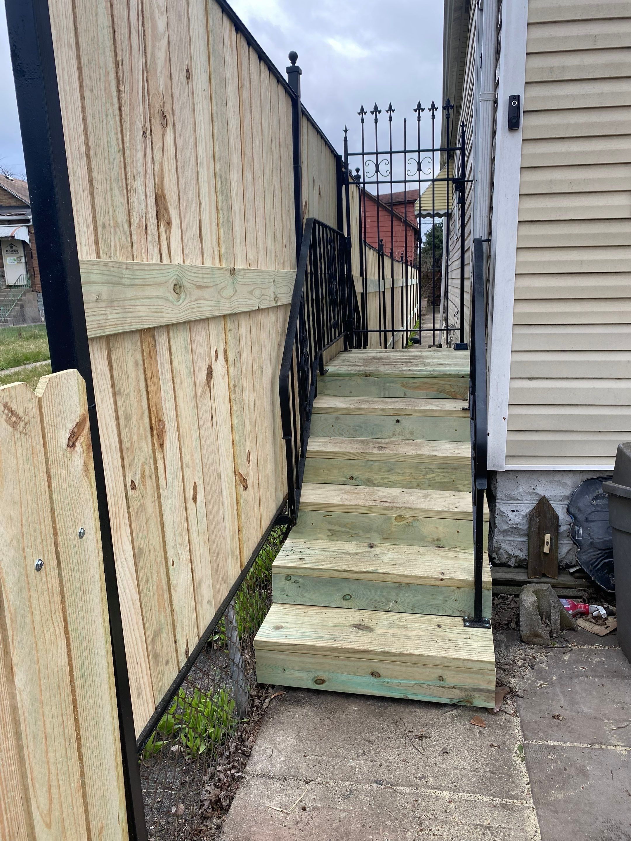 Fence Installation using pressure treated lumber  by INQUSE GENERAL CONTRACTOR