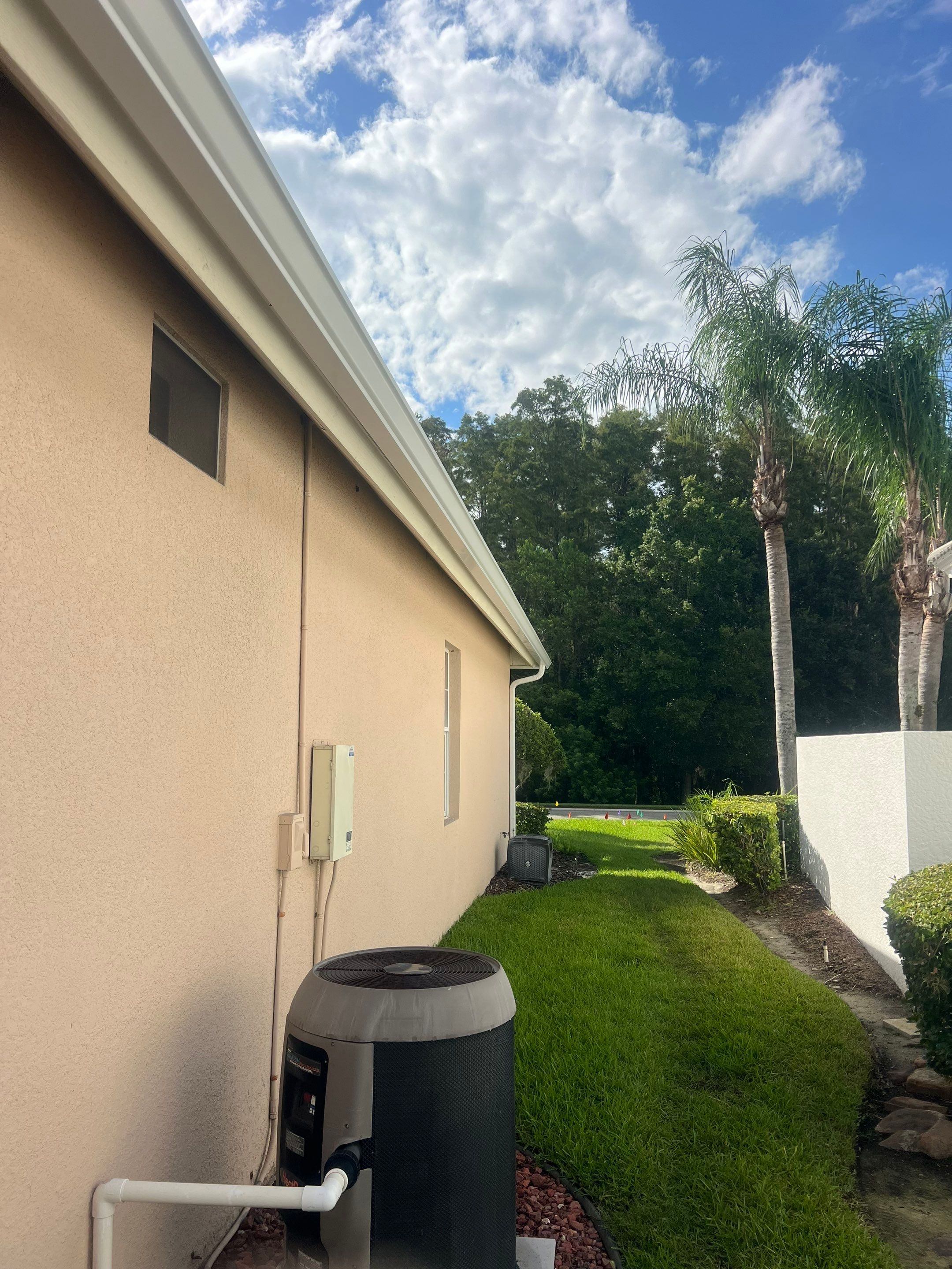 White Gutters and White Downspouts by Gutter Professors