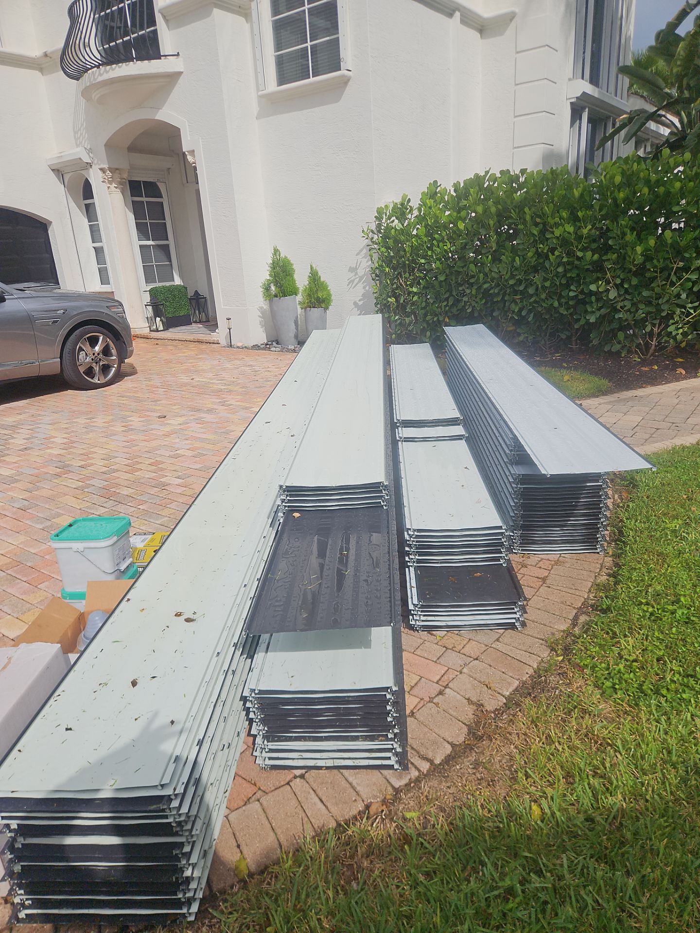 Residential Roofing Installation using 1" Nail strip metal roof by BLUES BROTHERS ROOFING
