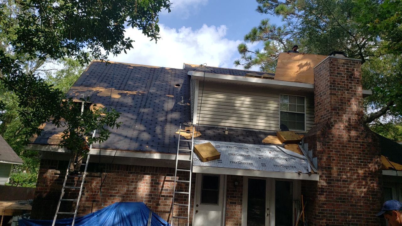 Residential Roofing Installation using Roof Replacement by American Roofing & Construction LLC
