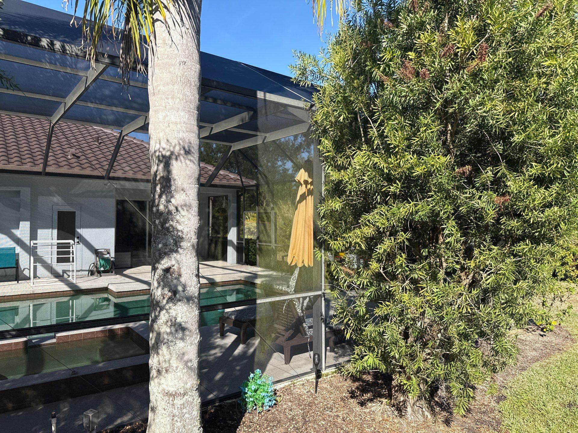 Painted Pool Deck, Lanai & Pool Cage Cleaning in River Club South – Bradenton, FL by Sunshine AquaWash